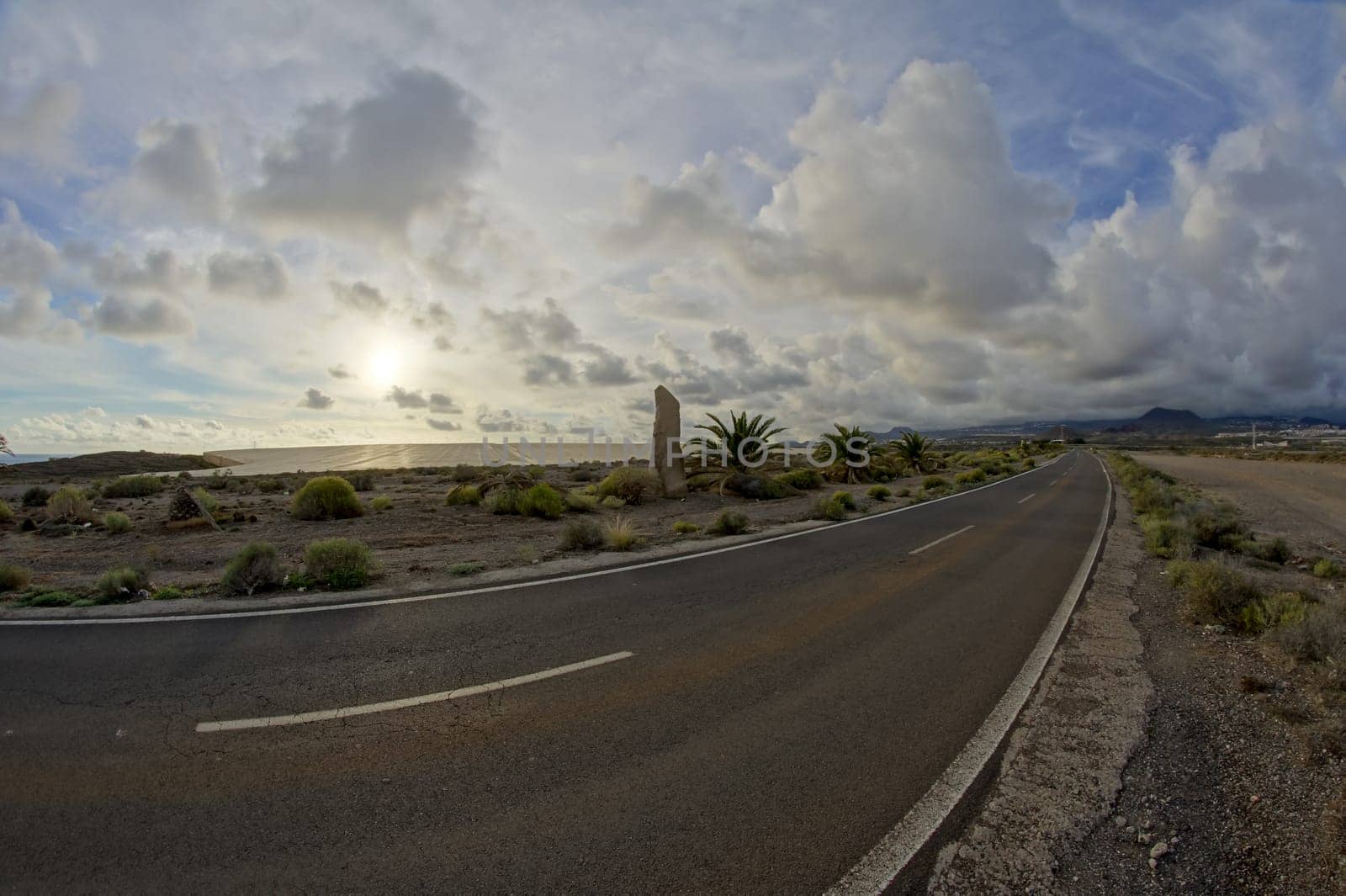 Long Empty Desert Road on a Cludy Day