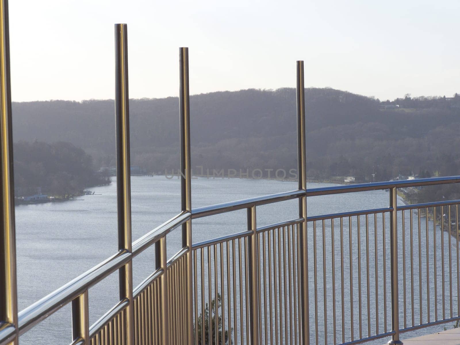 Stainless steel railing with handrail