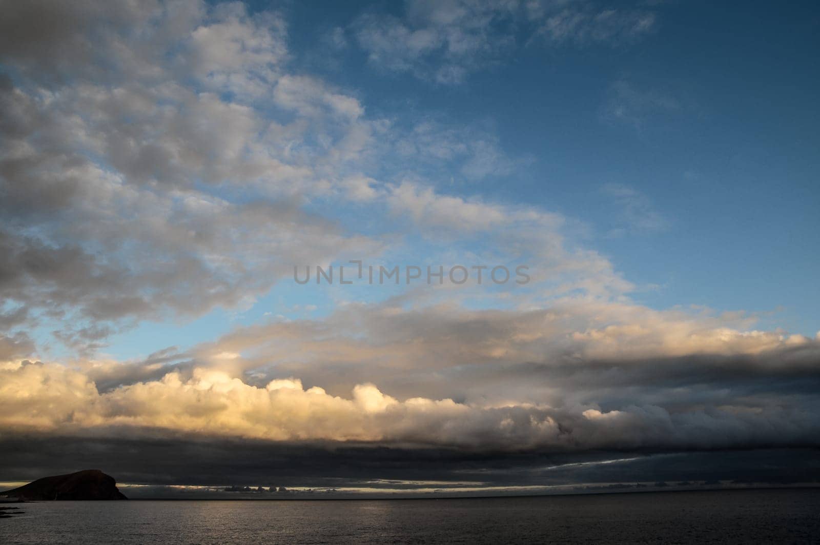 Cloudscape, Colored Clouds at Sunset near the Ocean