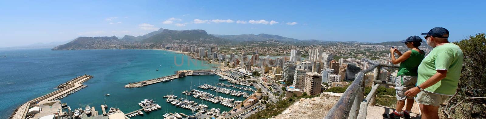 Panoramic view over Calp (Spain). Town bay beach