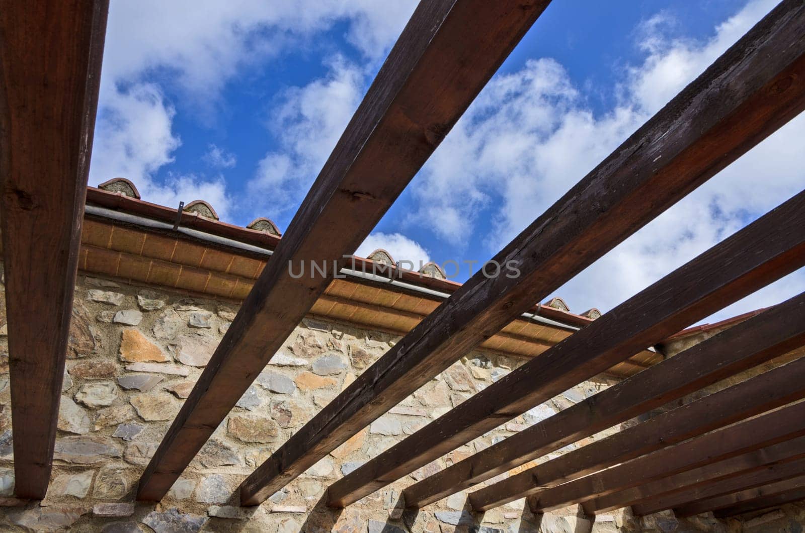 Wooden pergola bult in a rural farm in the tuscany countryside