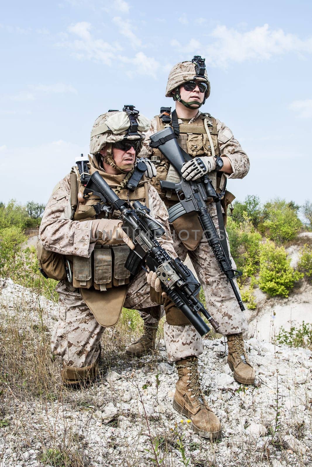 Two soldiers in the mountains during the military operation