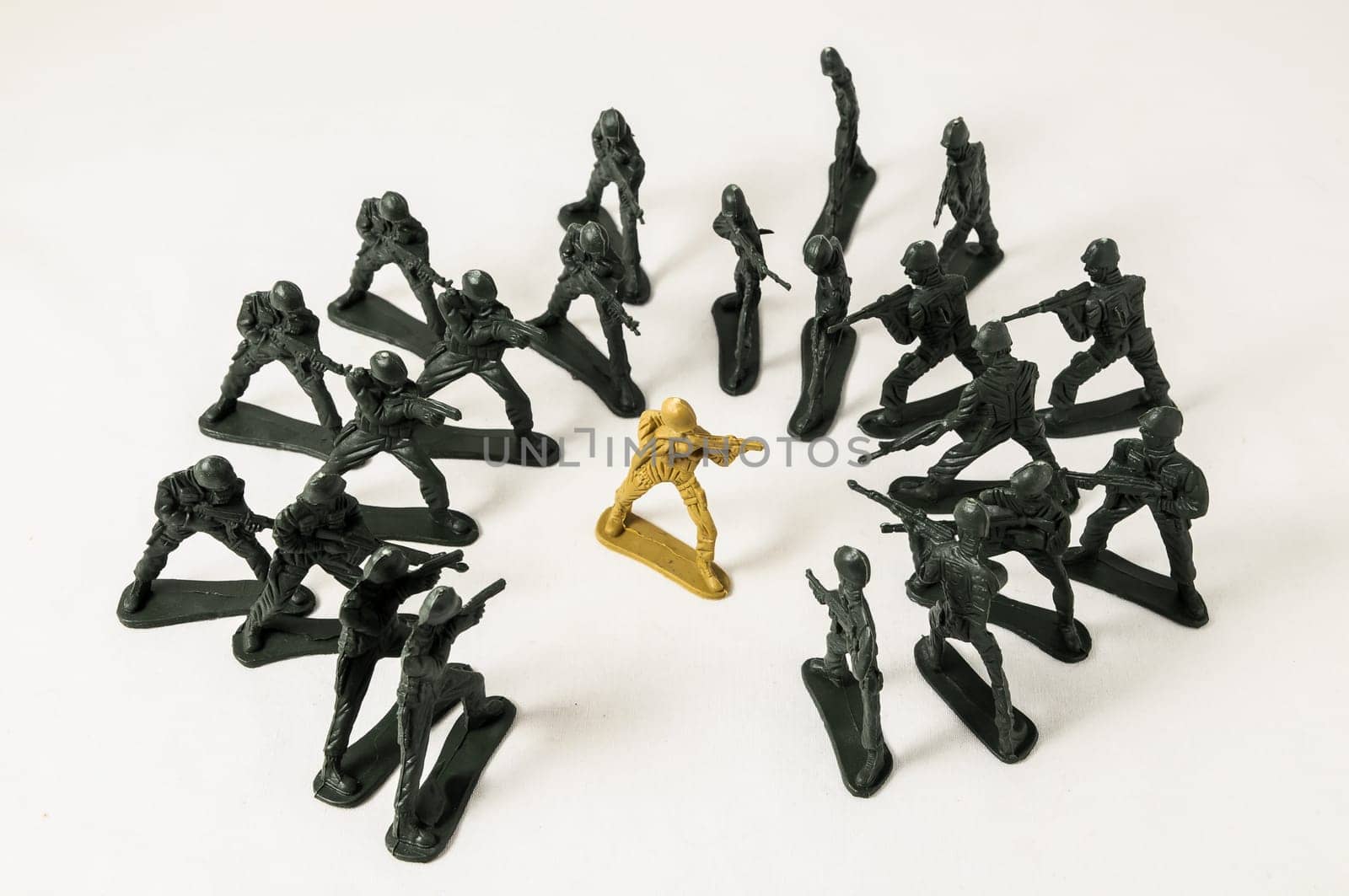 Plastic Lead Soldiers Representing War on a White Background