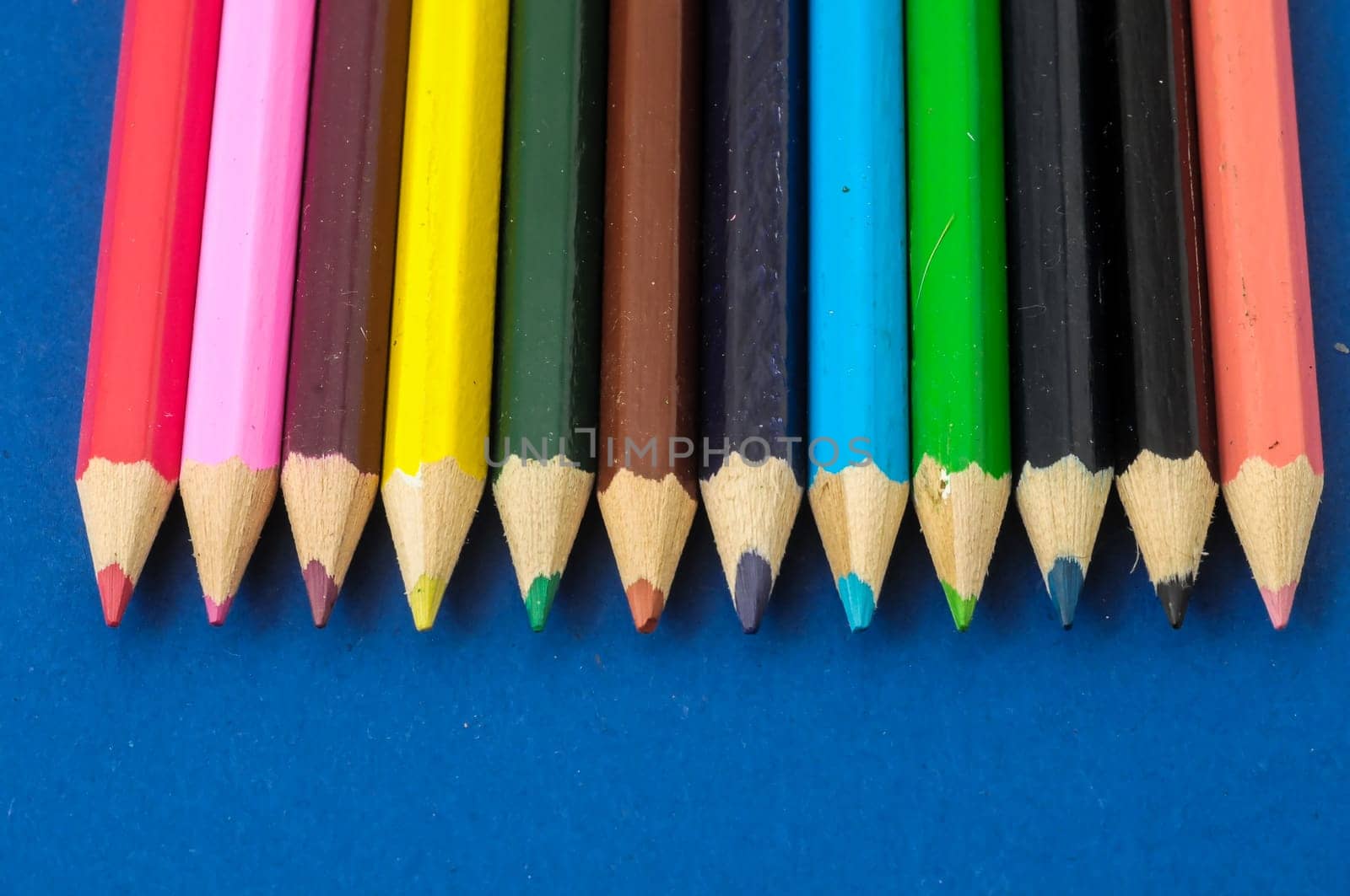 New Pencils Textured Set on a Colored Background