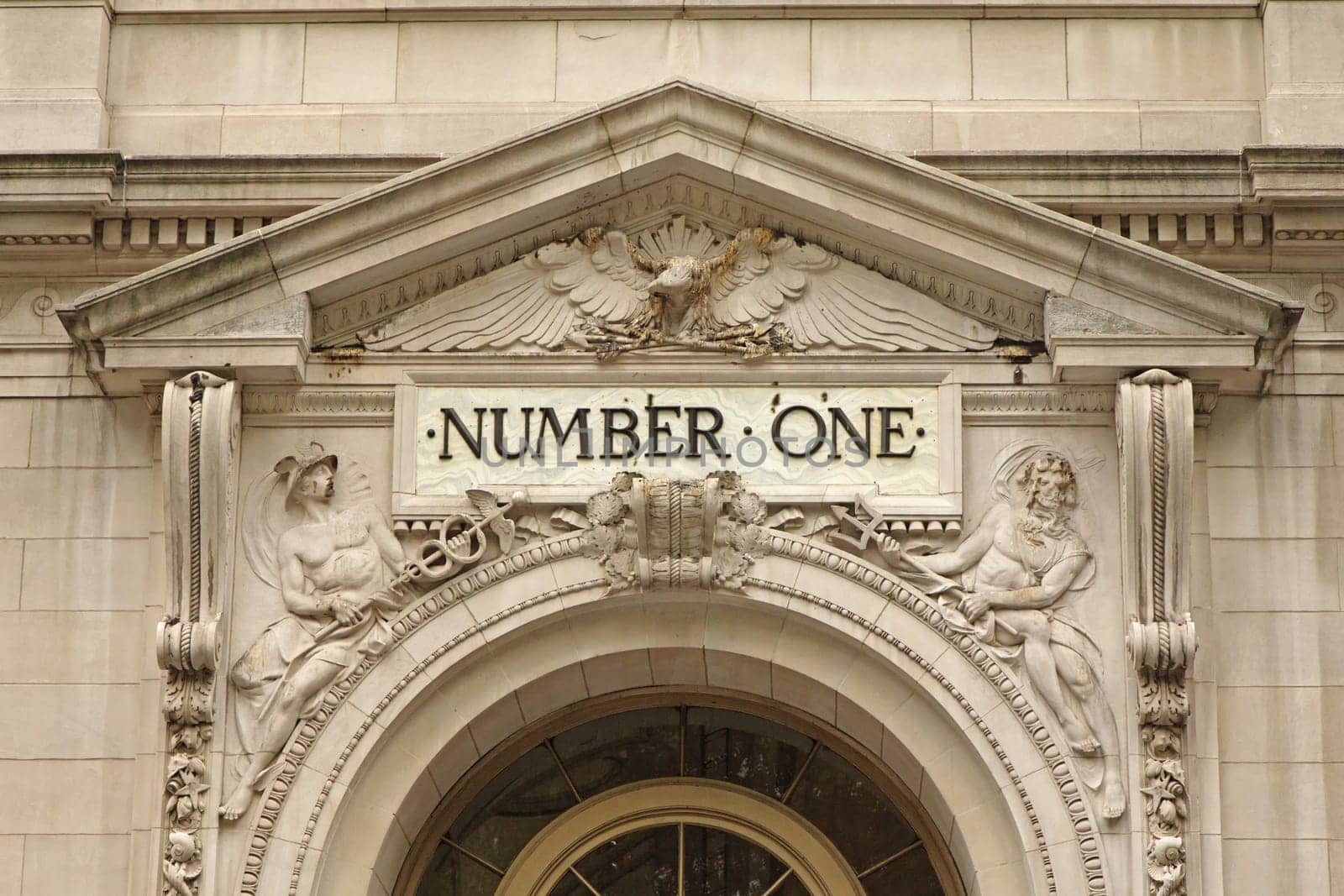 The facade of the building with the inscription NUMBER ONE above the entrance