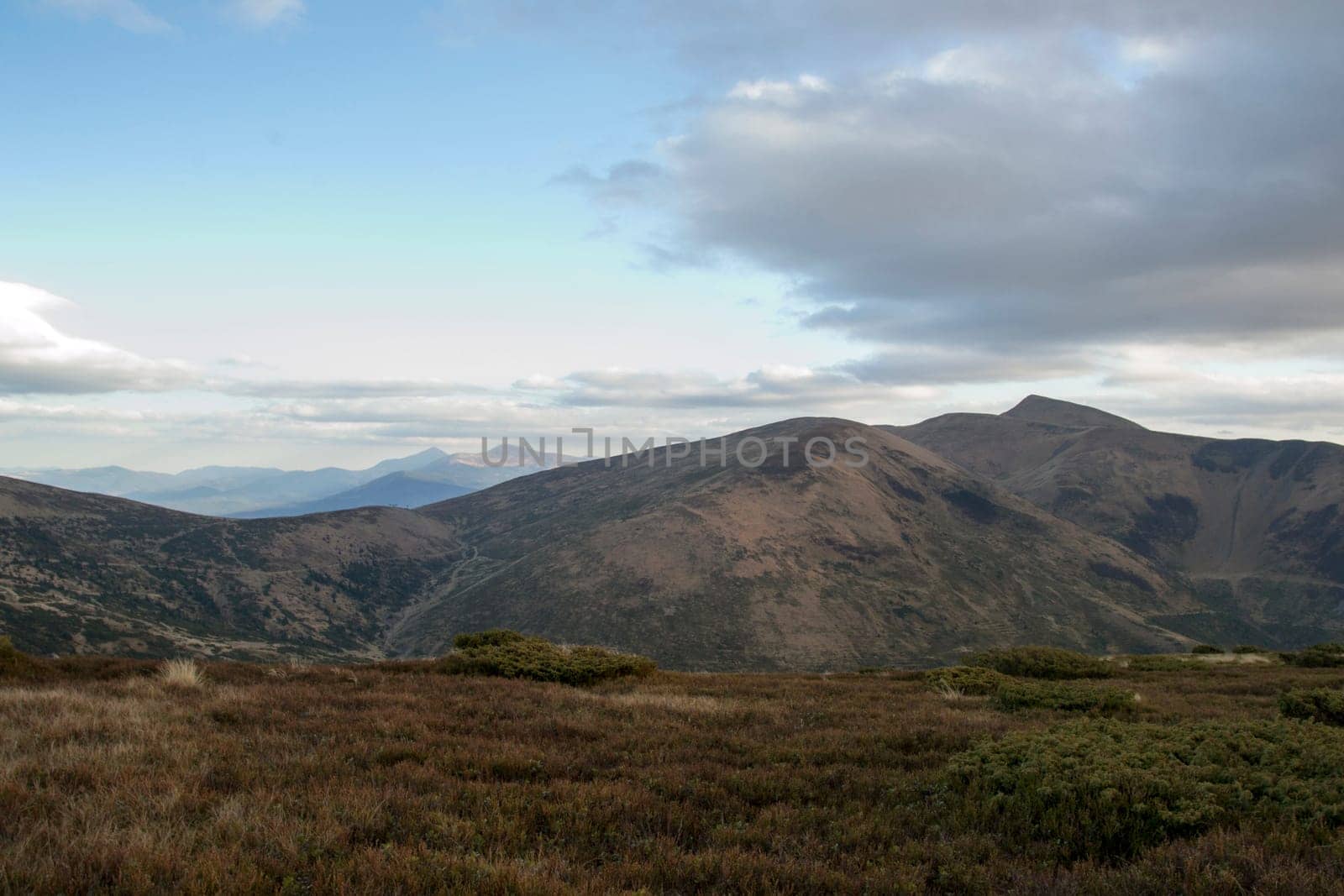 Rain clouds over the plateau in the mountains