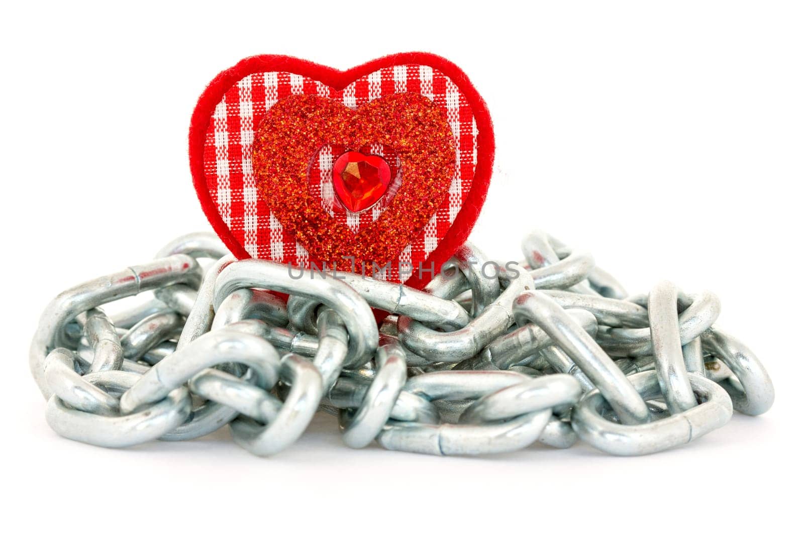 Red heart shape with chains on white background