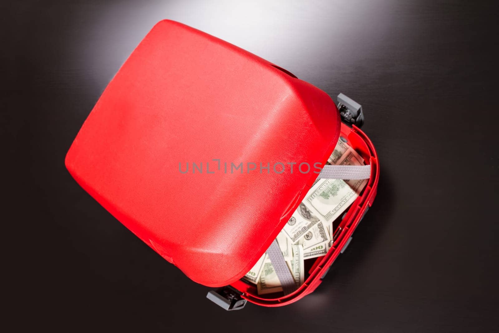 A Suitcase with lots of dollars.