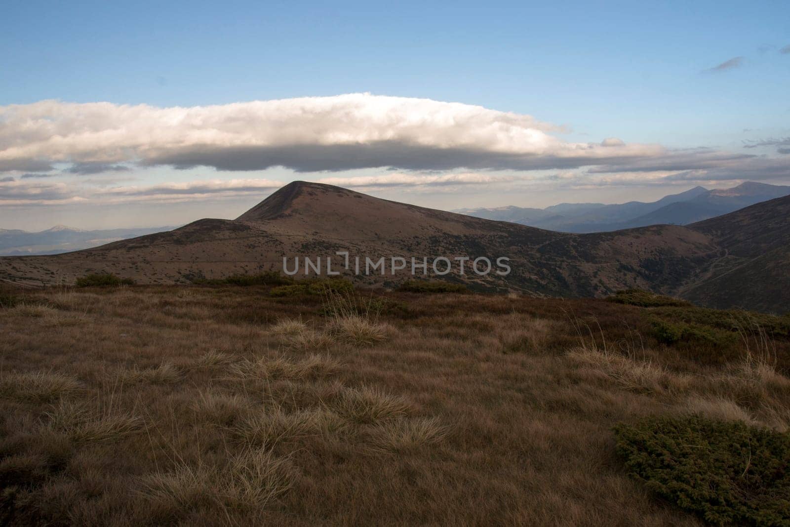 Rain clouds over the plateau in the mountains