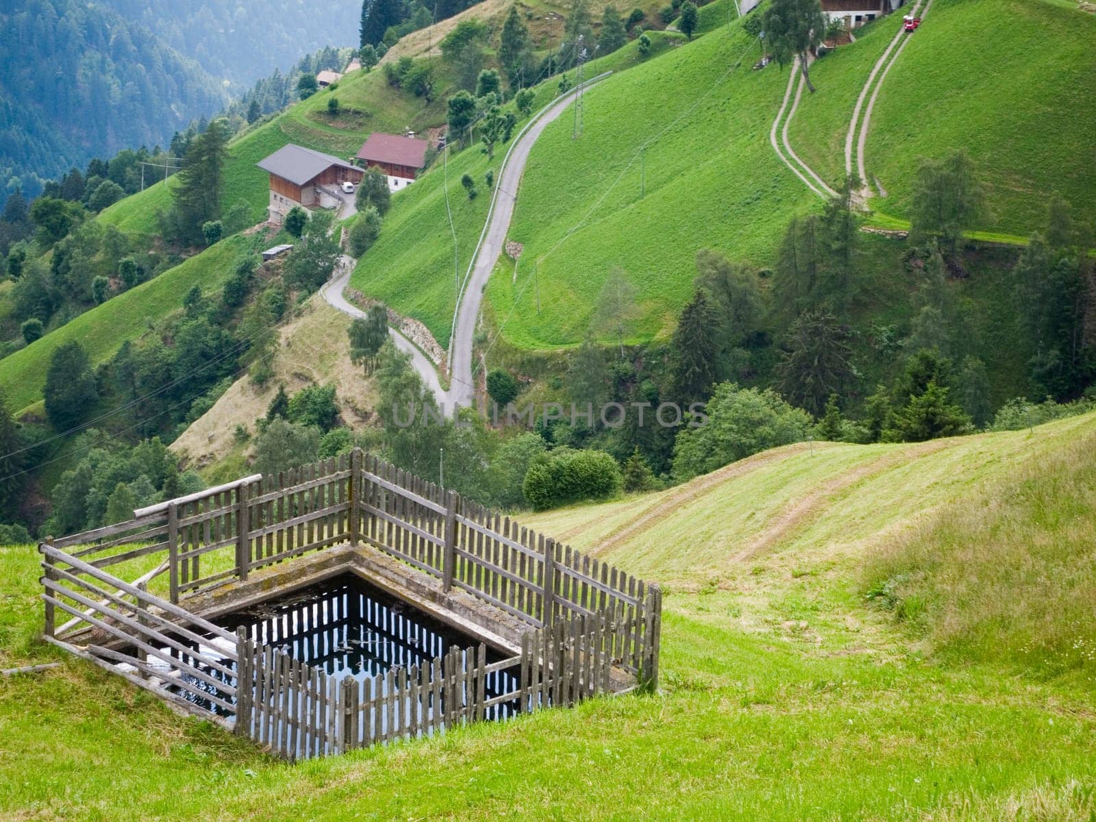 increased views of farmsteads below the mountain village of Videgg in summer