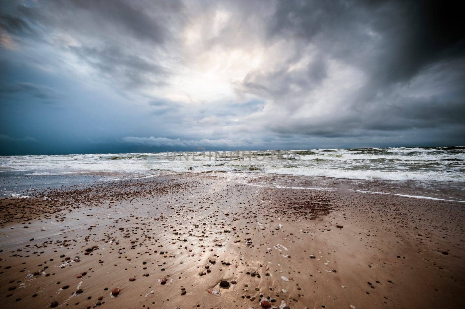 a seaview with the stormy sea,visible small waves and clouds,ultra wide angle of view.