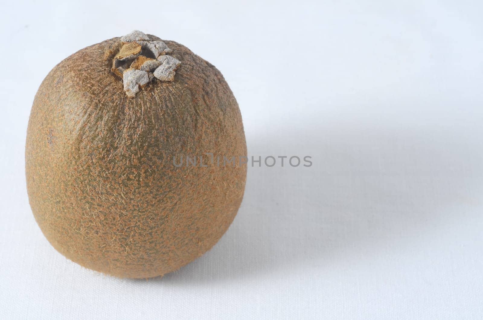 Very Ripe Healthy Kiwi on a White Background