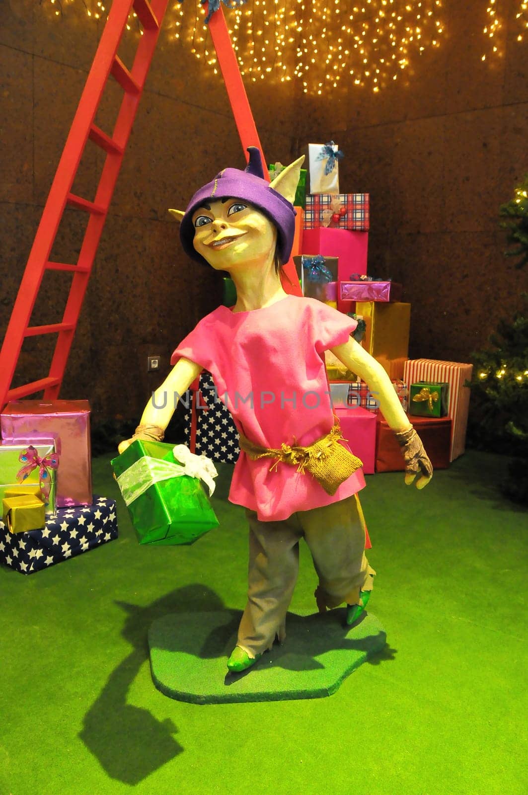 Modern Statue of a Christmas Elf with Gifts