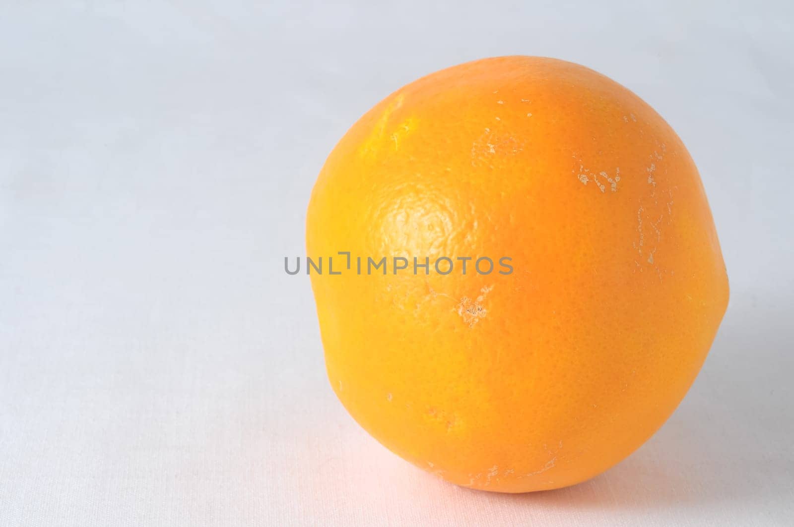 Very Ripe Healthy Orange on a White Background