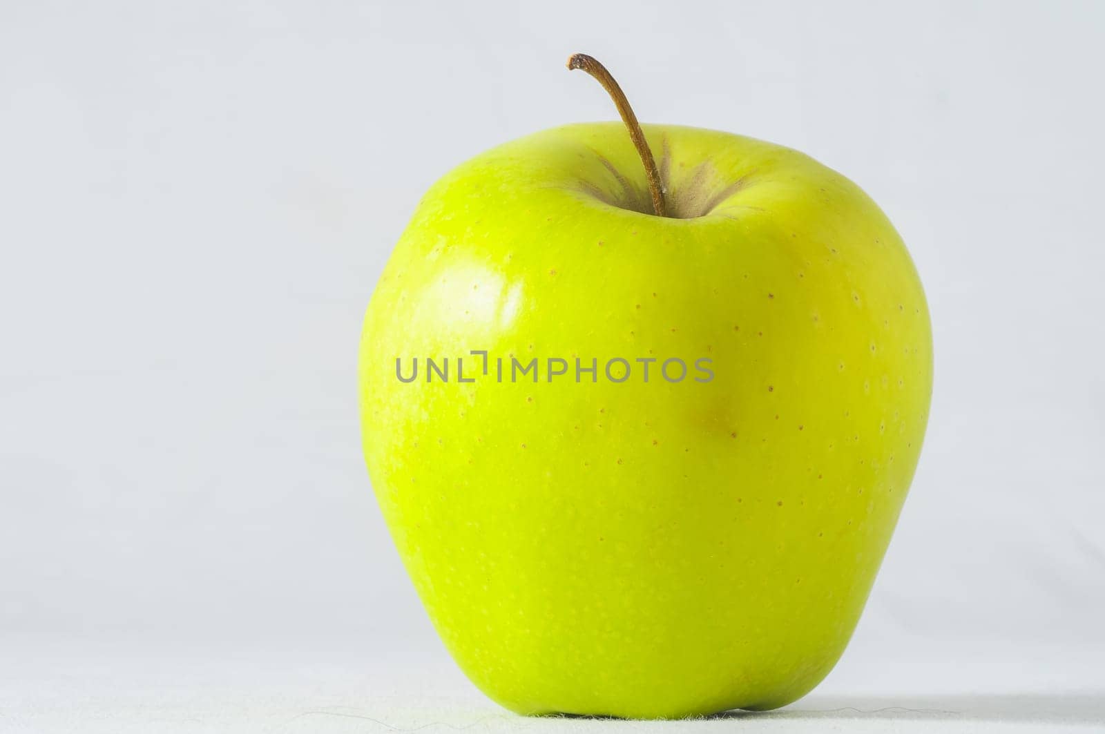 Very Ripe Healthy Apple on a White Background