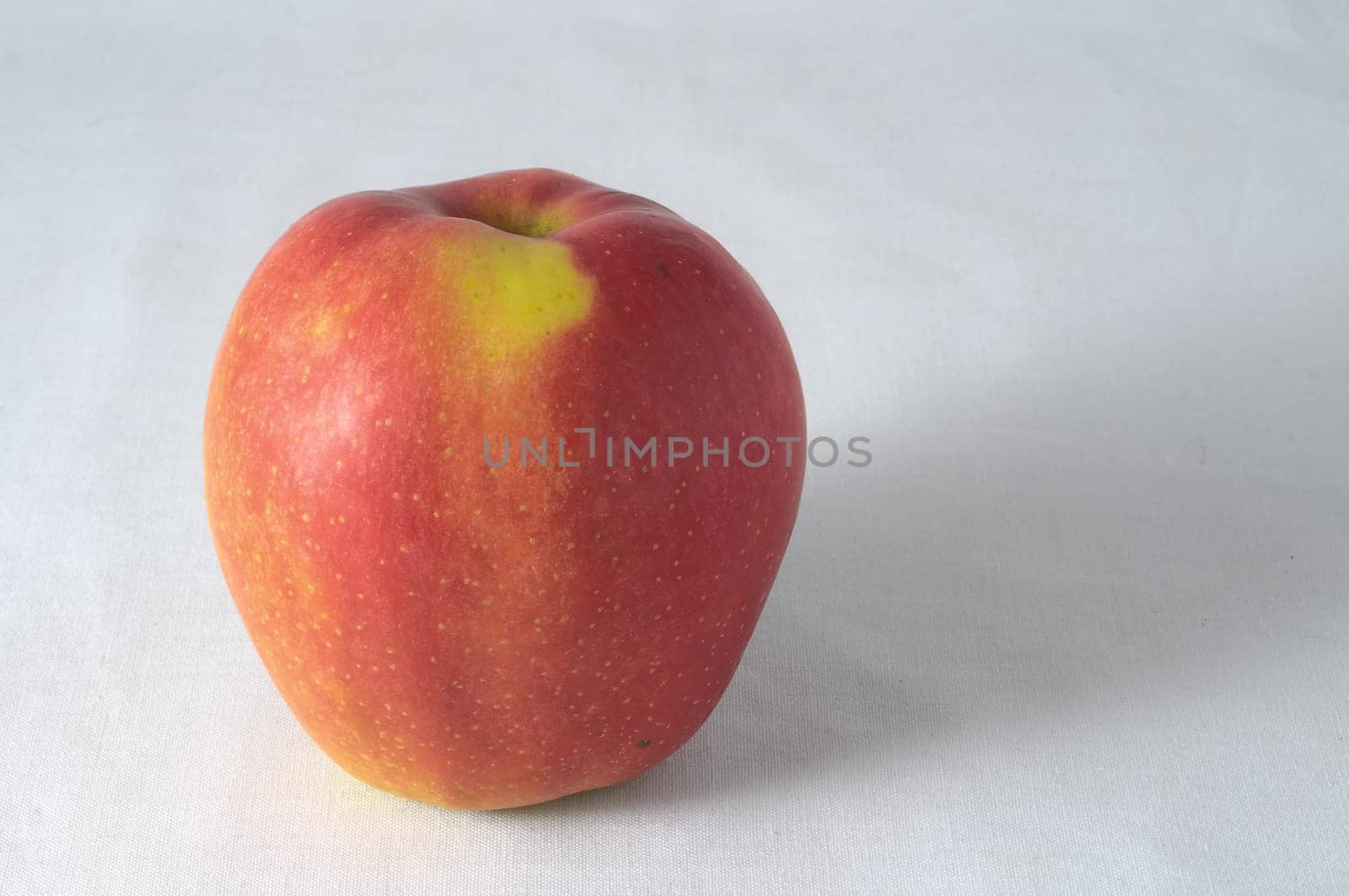 Very Ripe Healthy Apple on a White Background