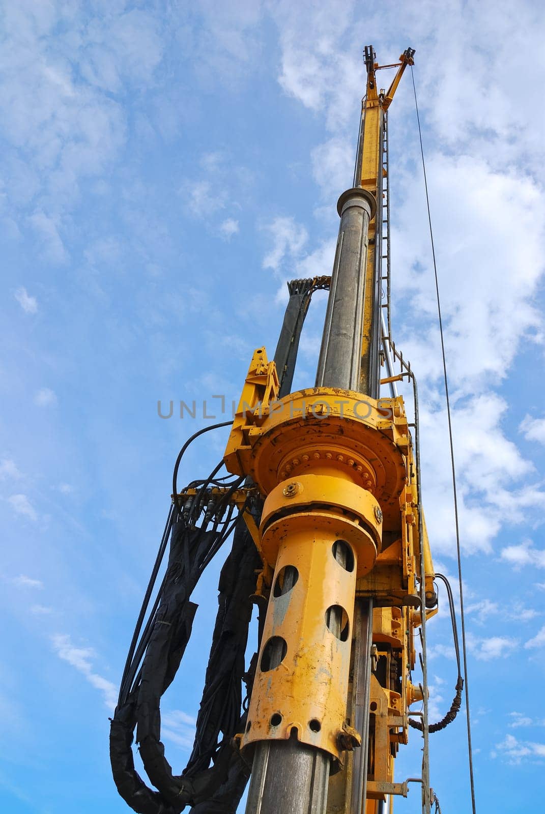 Guide rail of an auger on the construction site