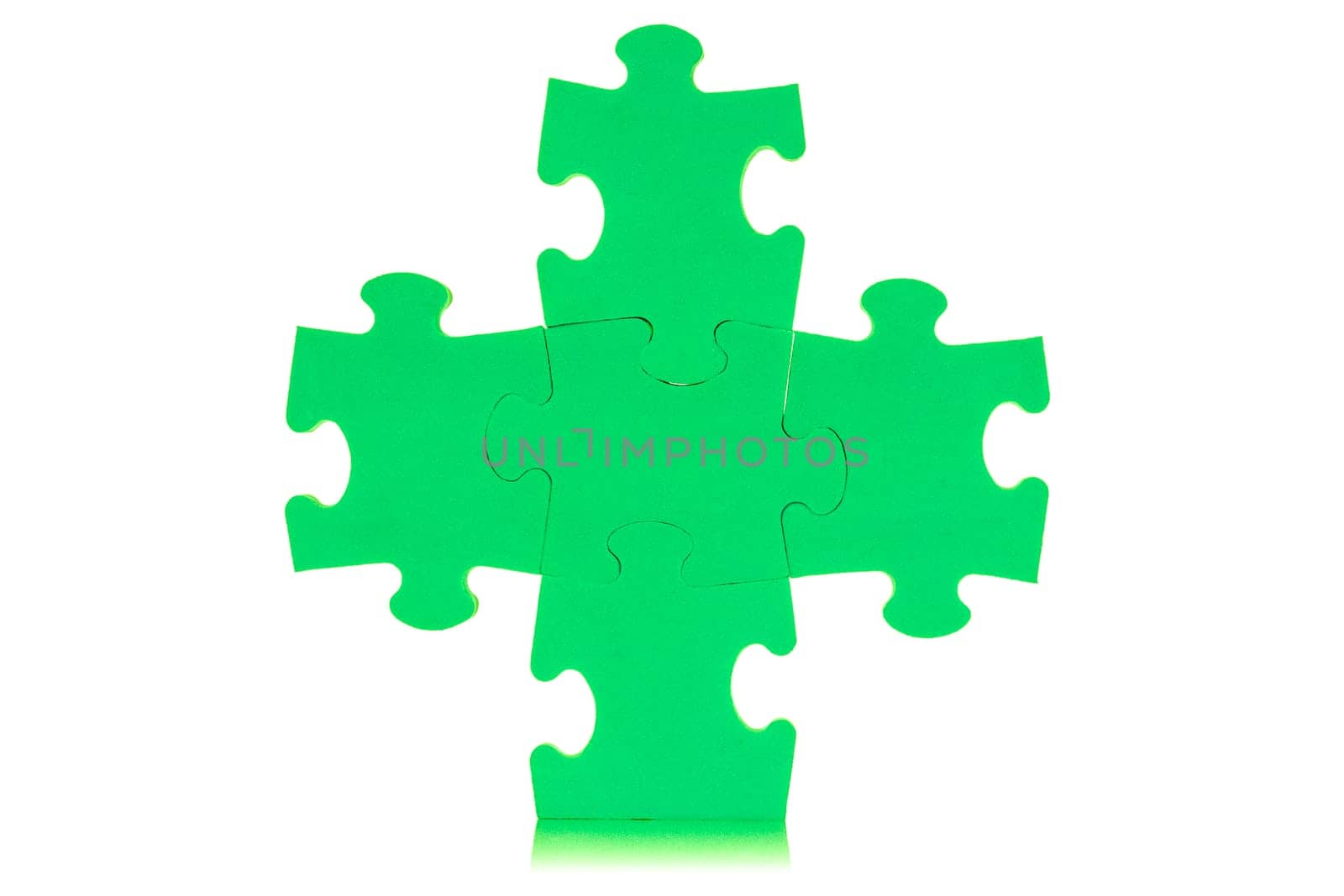 Five attached green puzzles, isolated over white background