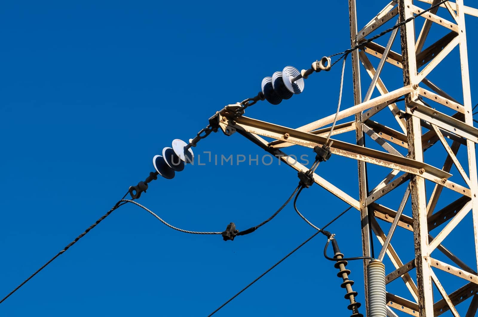 Energy Electricity Power Pylon on a Blue Sky