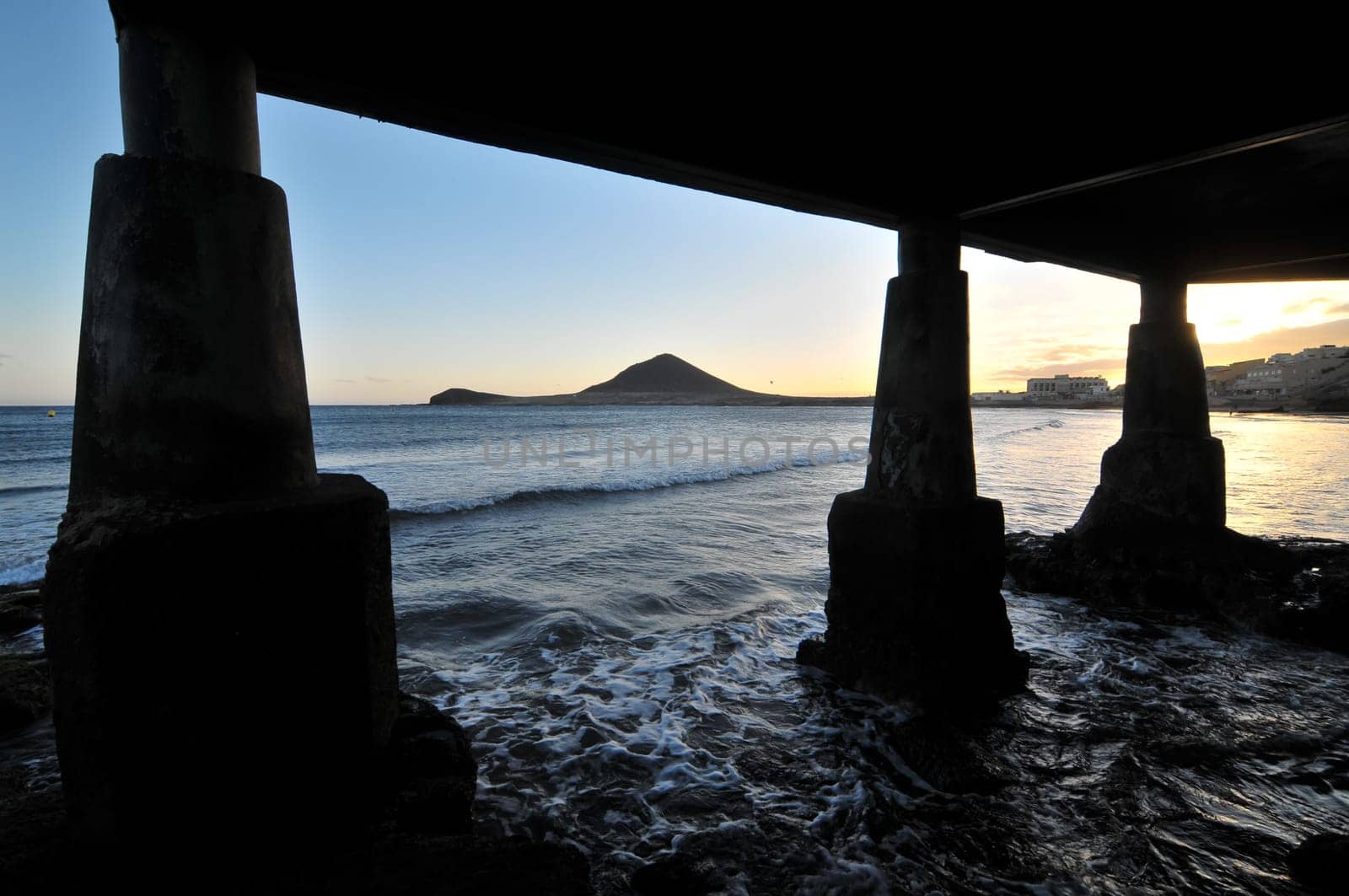Sunset on the Atlantic Ocean with a Mountain in Background El Medano Tenerife Canary Islands Spain