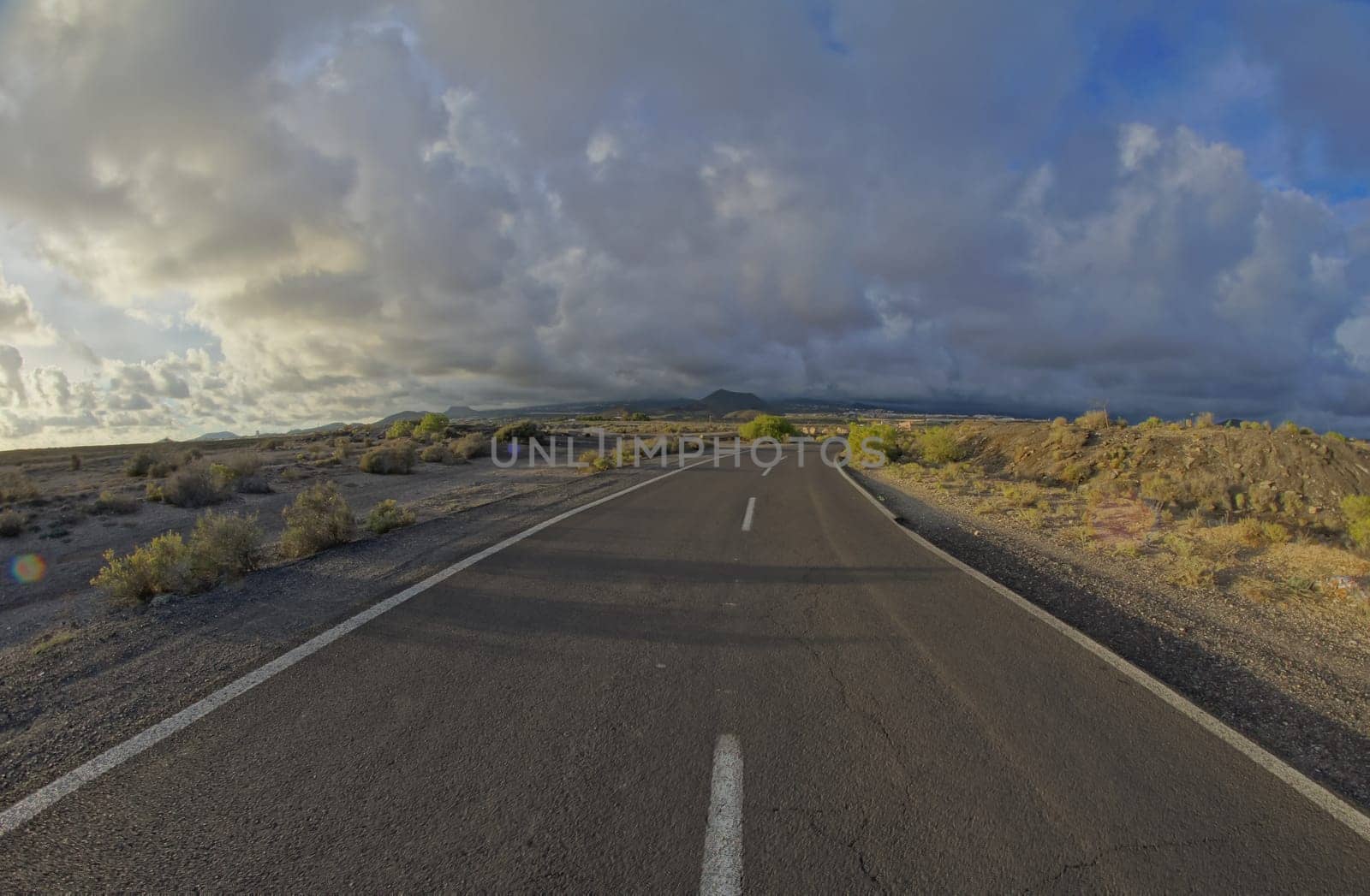 Long Empty Desert Road on a Cludy Day