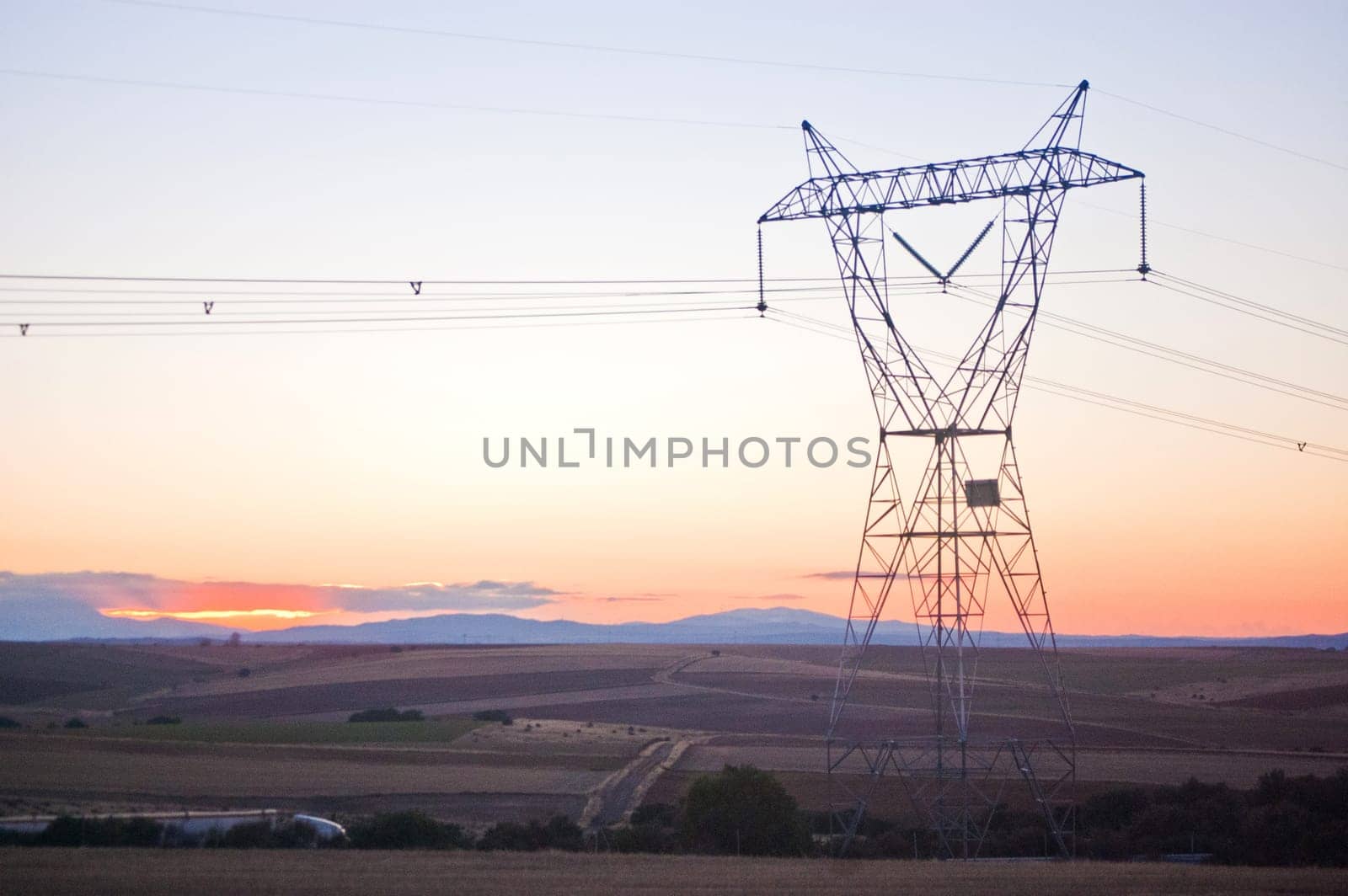High voltage power line blue sky