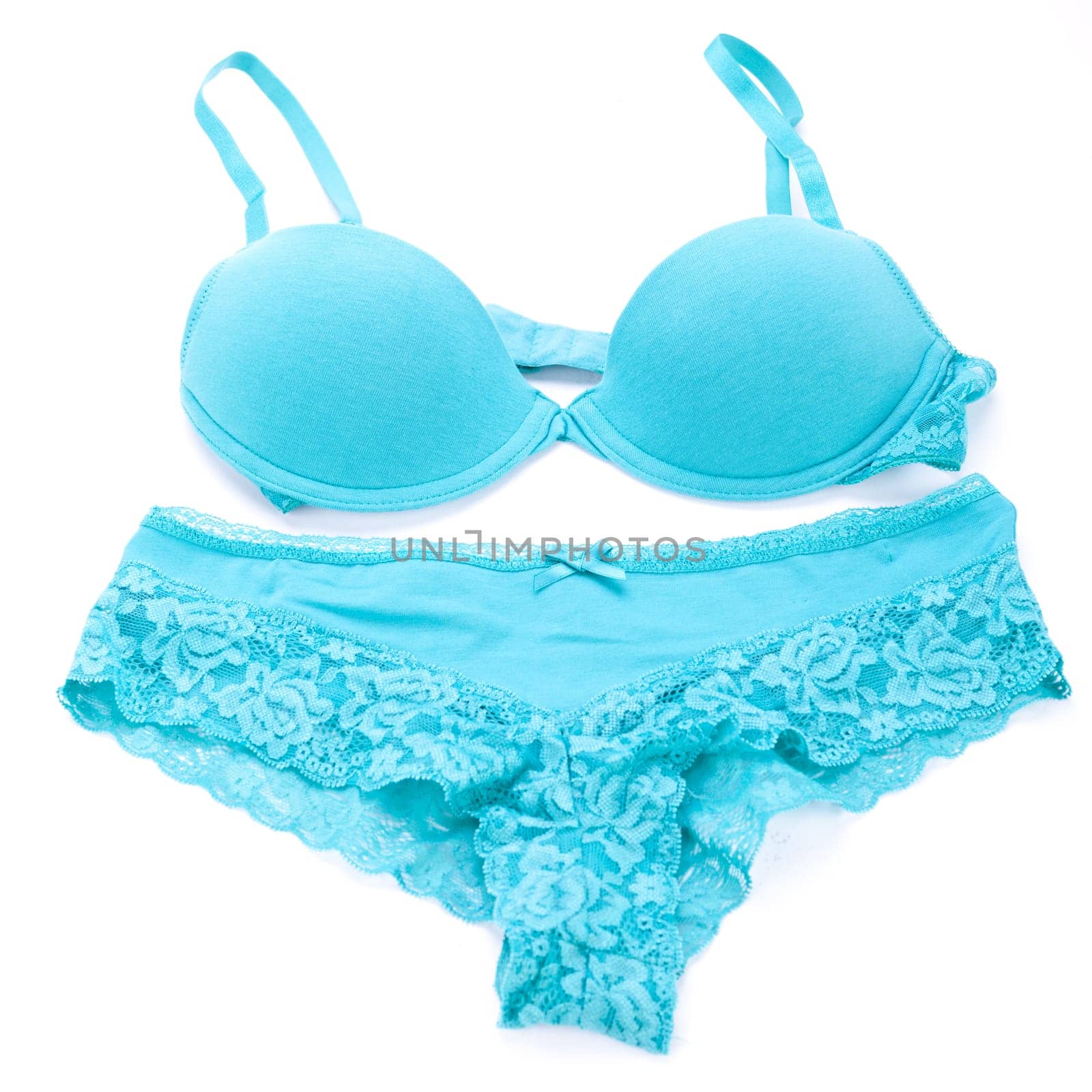 Underwear set with bra Brassiere and panties Underpants in turquoise close-up on white background