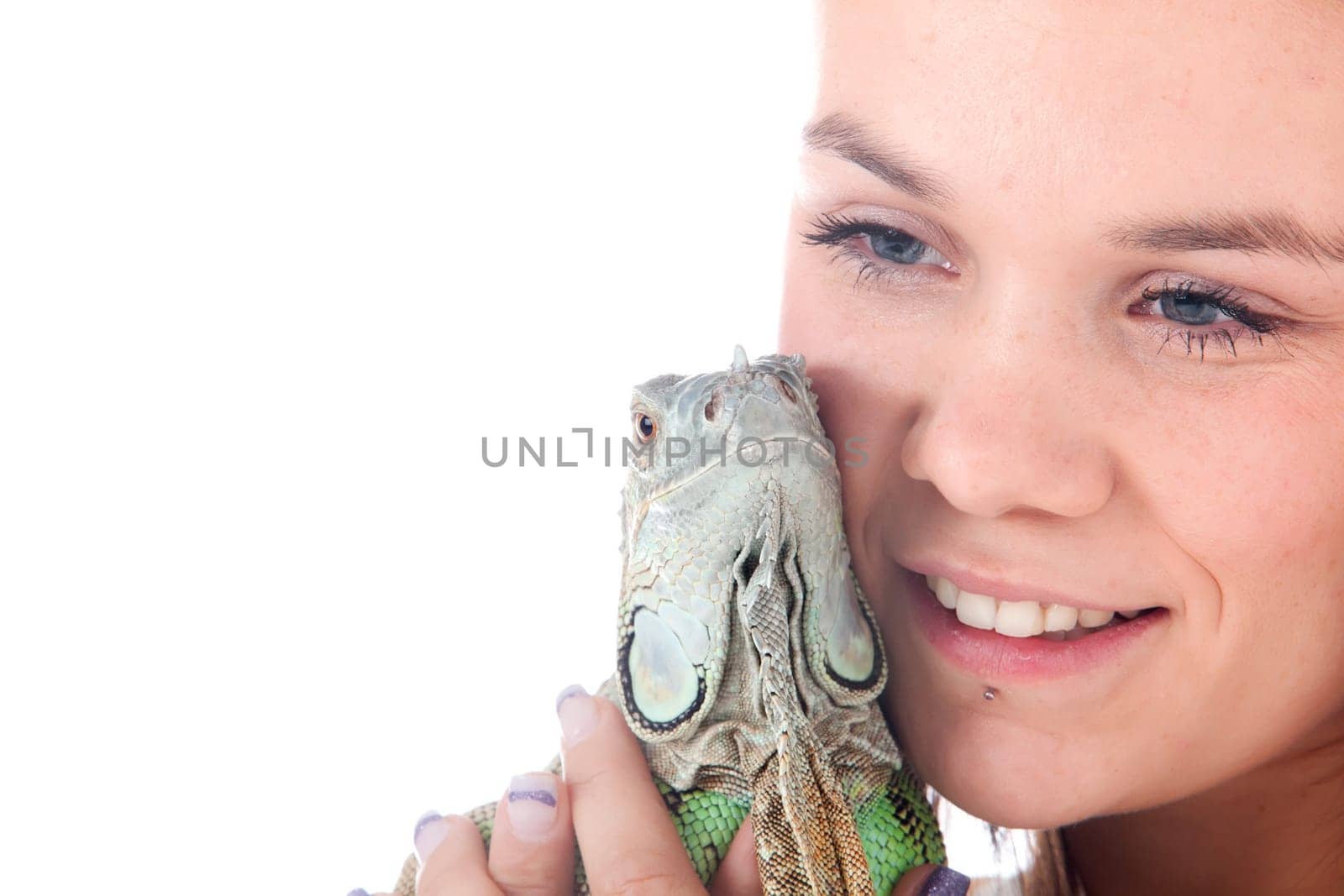Young adults in a white studio having fun