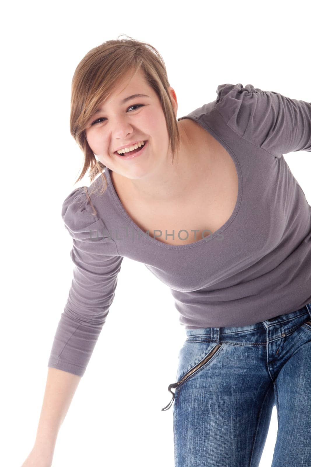 Young teenager in de studio on white