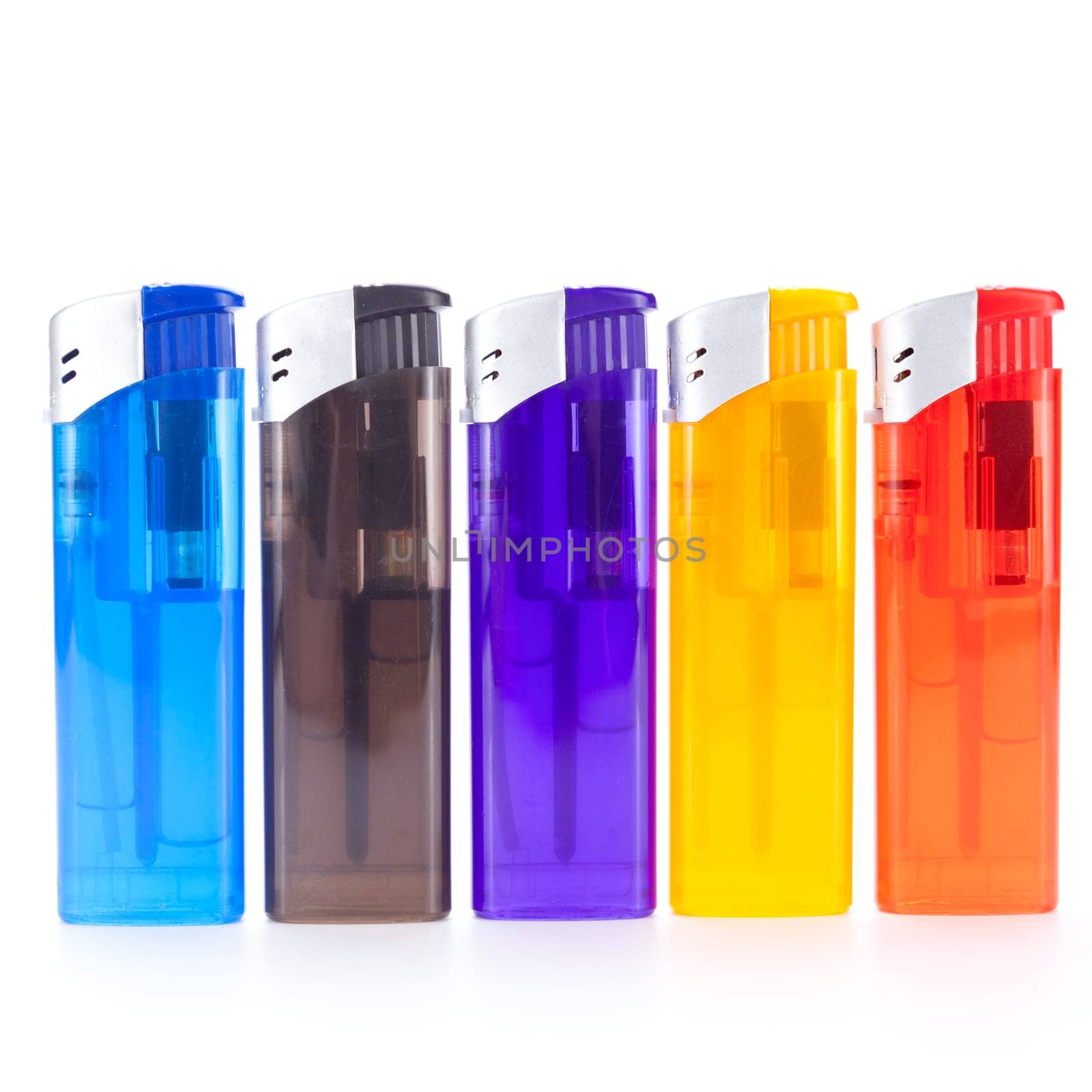 Row of different coloured lighters with electric piezo ignition insulated against a white background
