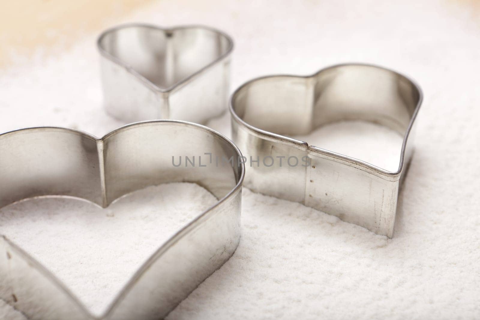 Close-up cookie cutter in flour