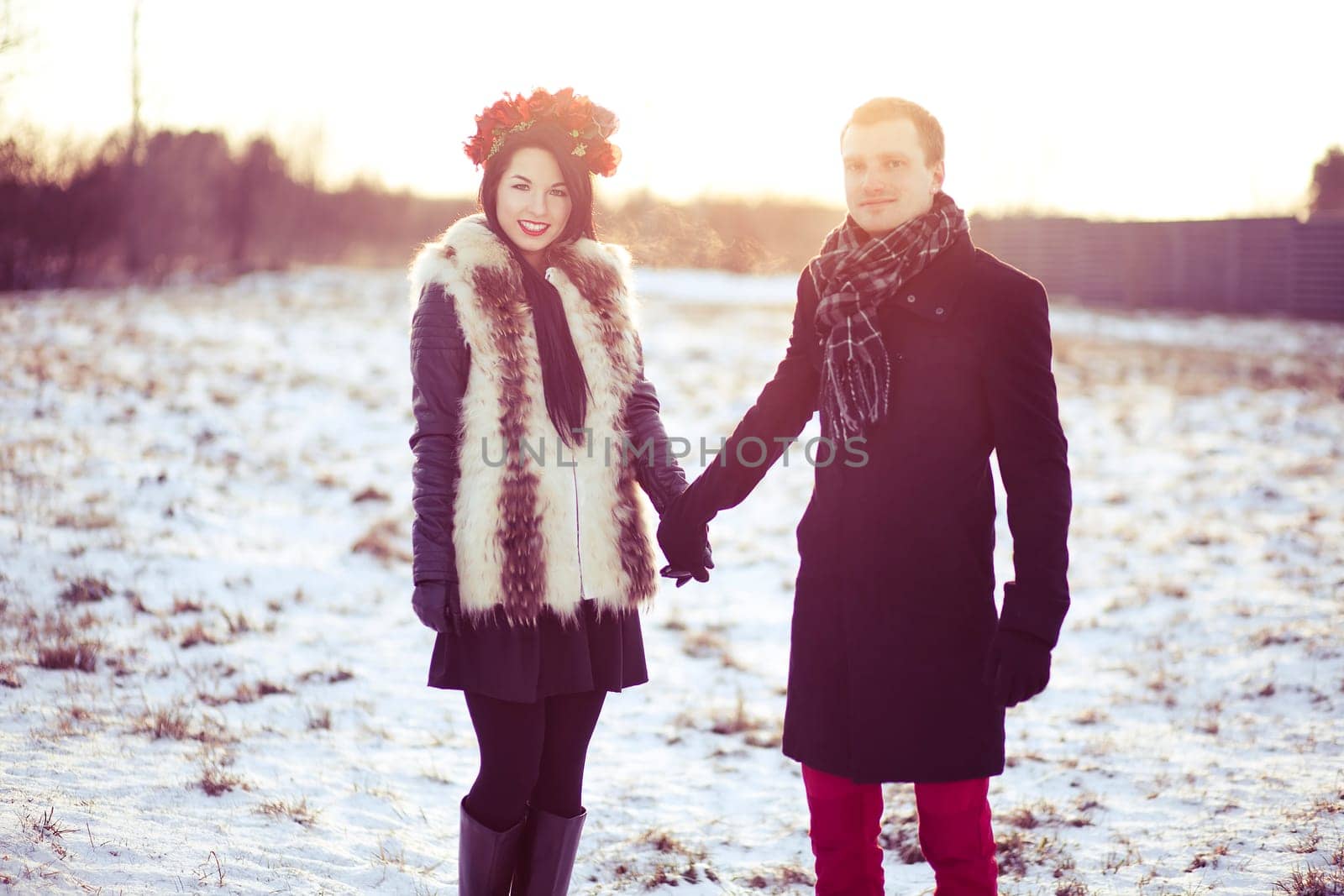Happy young couple have a healthy walk outside on the nature