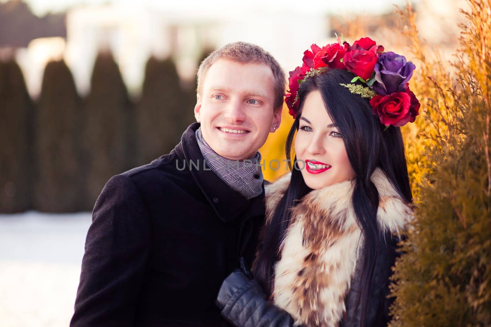 Happy young lovers in the backyard on valentine's day