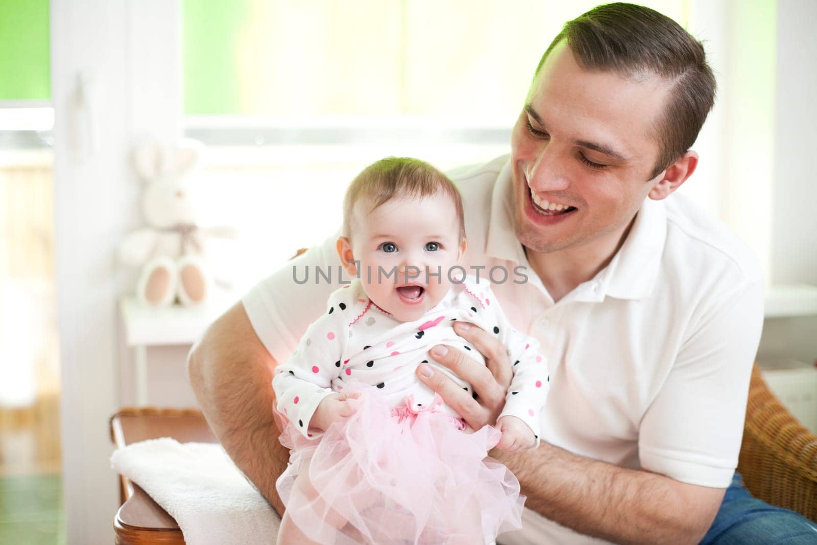 Father and his baby dauther in ballet dancer dress