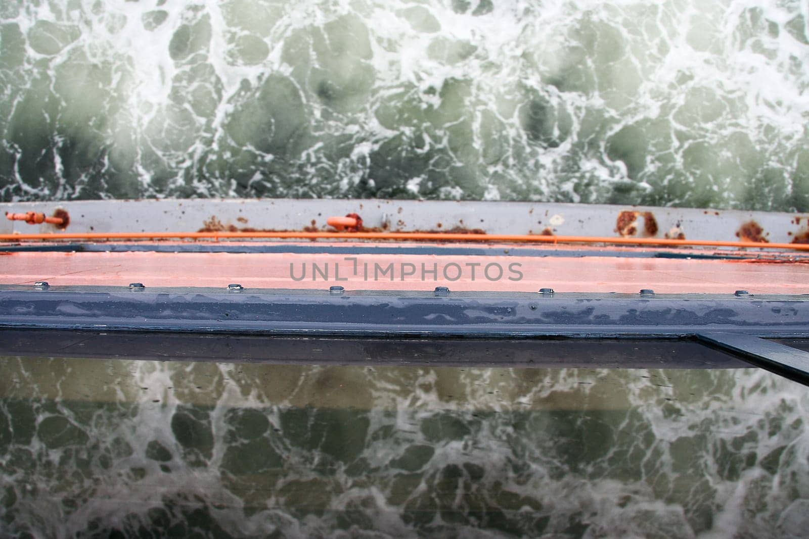 Water reflections on board of Staten Island Ferry