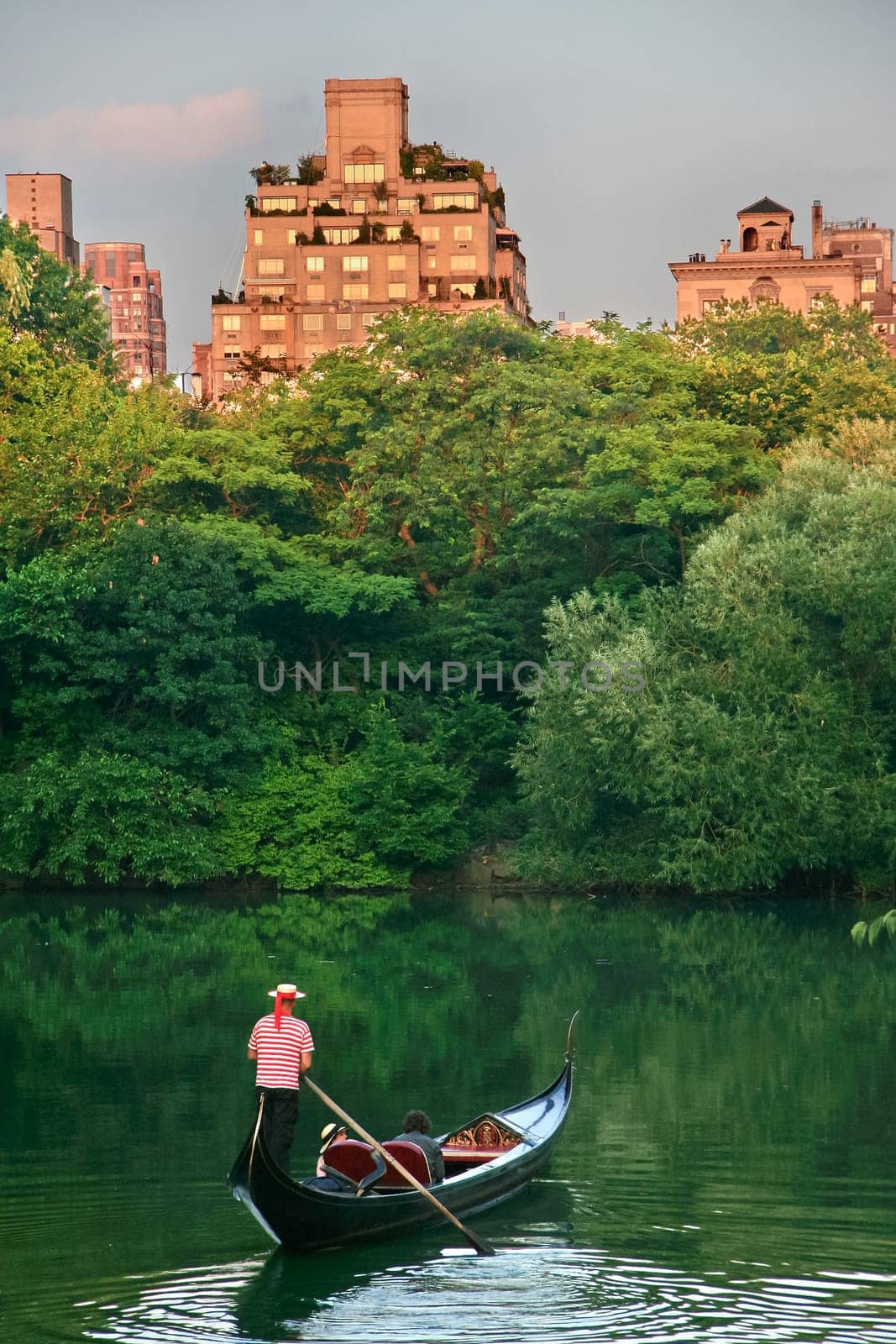 Gondolier at the lake in Central park, New York