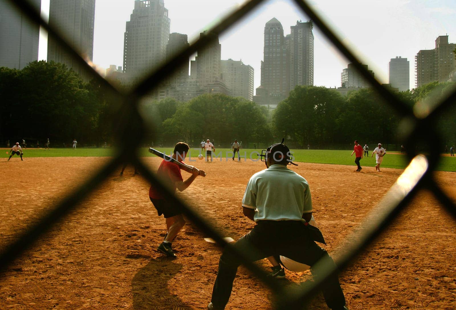 NEW YORK CITY - JUNE 23: Baseball team playing at Heckscher Ballfields in Central Park on June 23, 2008.There are 26 softball and baseball fields open to the public in Central Park