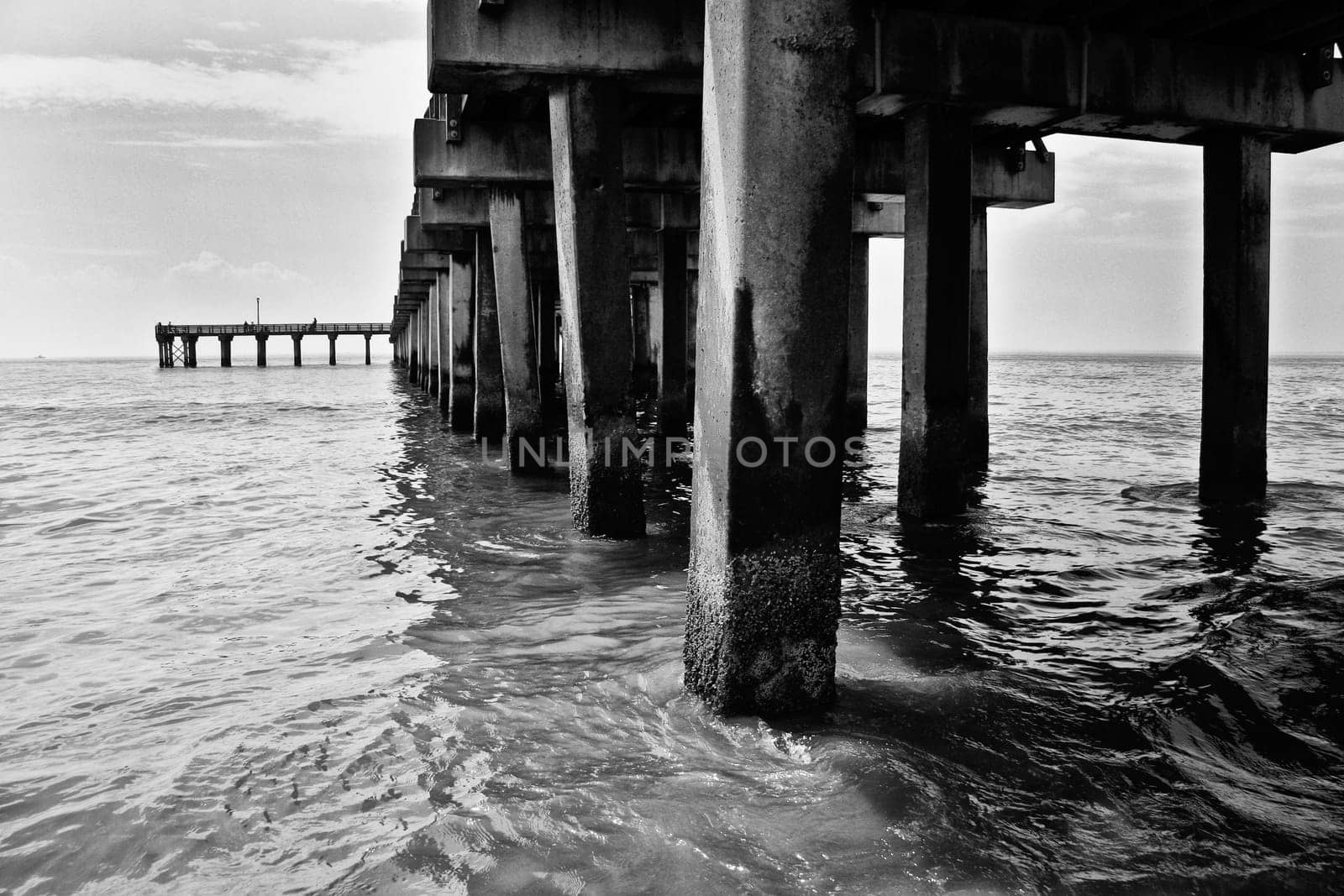 Pier. Beach at Coney Island, New York City.Black and white shot