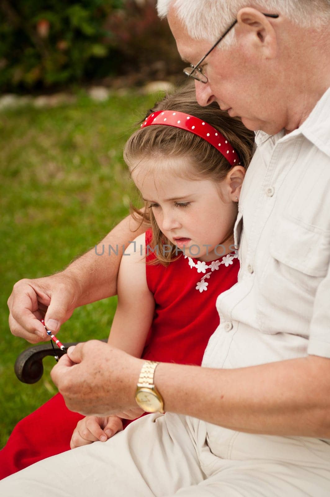 Happy retirement - grandparent with grandchild