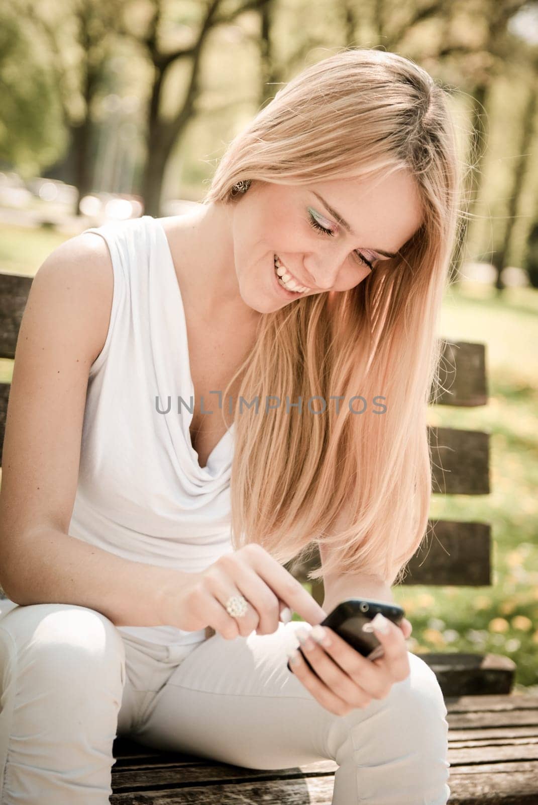 Mobile communication - smiling teenager