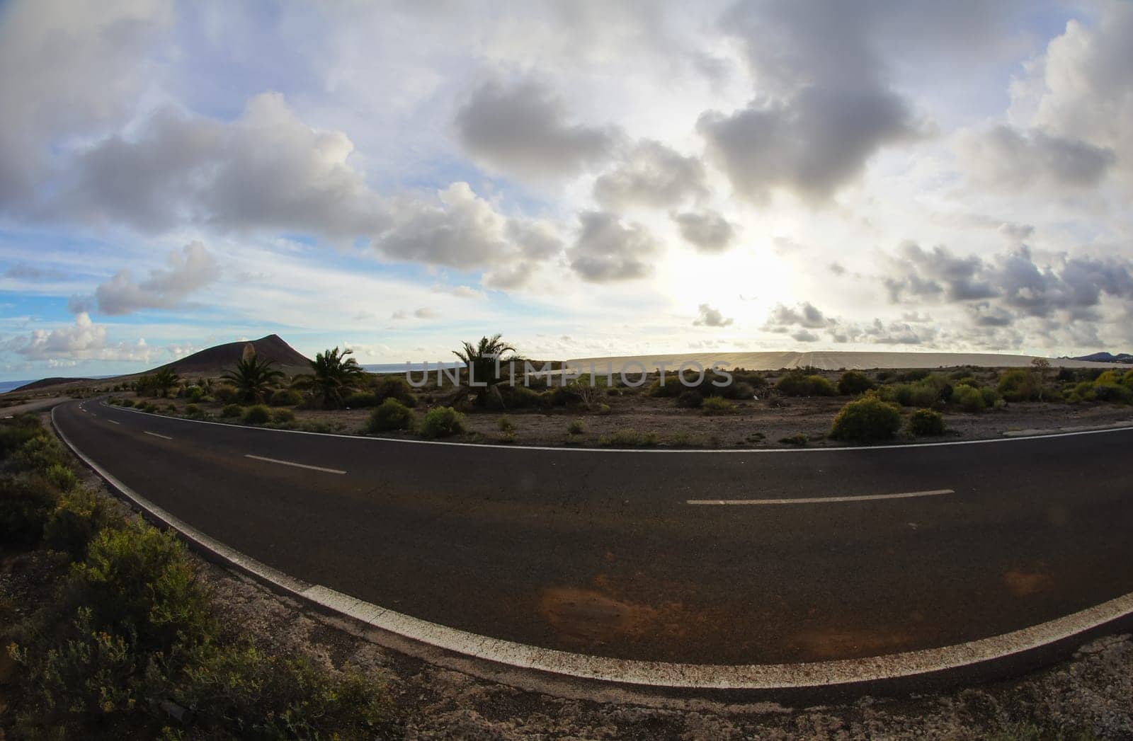 Long Empty Desert Road on a Cludy Day