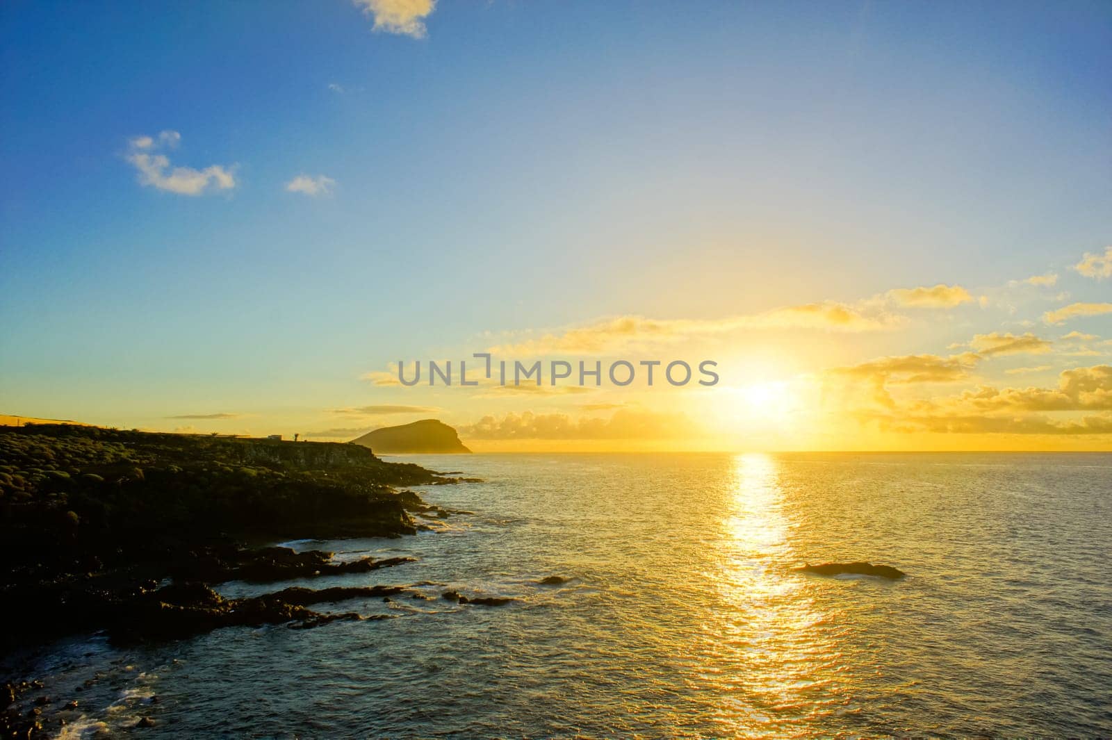 Colred Sunrise Clouds over the Atlantic Ocean in Tenerife Canary Islands