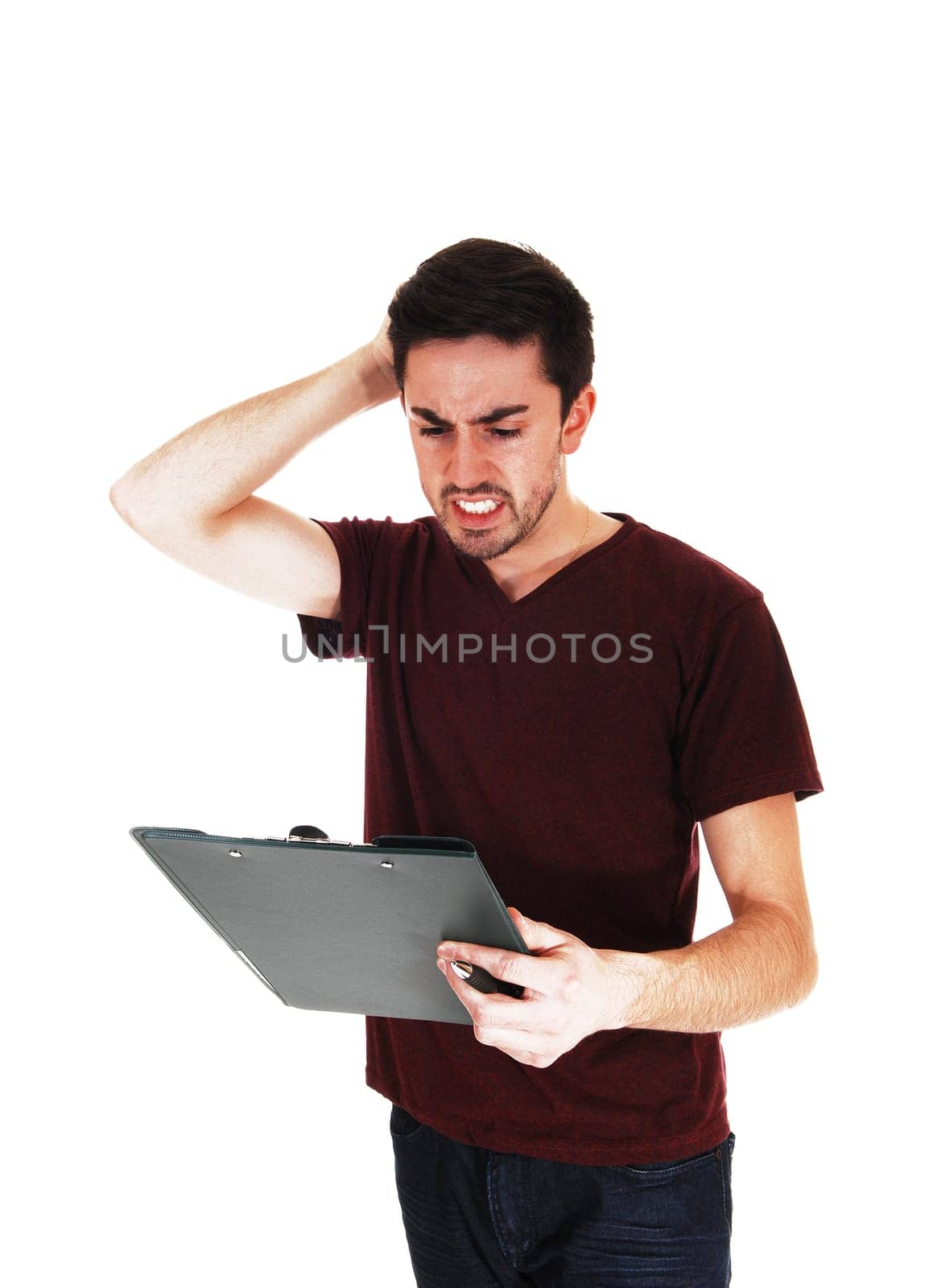 A very angry young man has a problem with his checklist, for white.background..