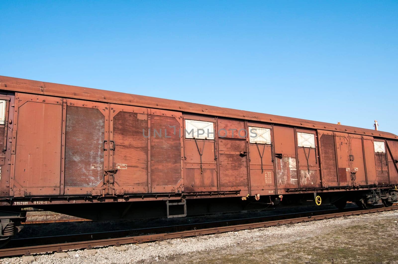 Obsolete wooden cargo railway wagon in perspective view