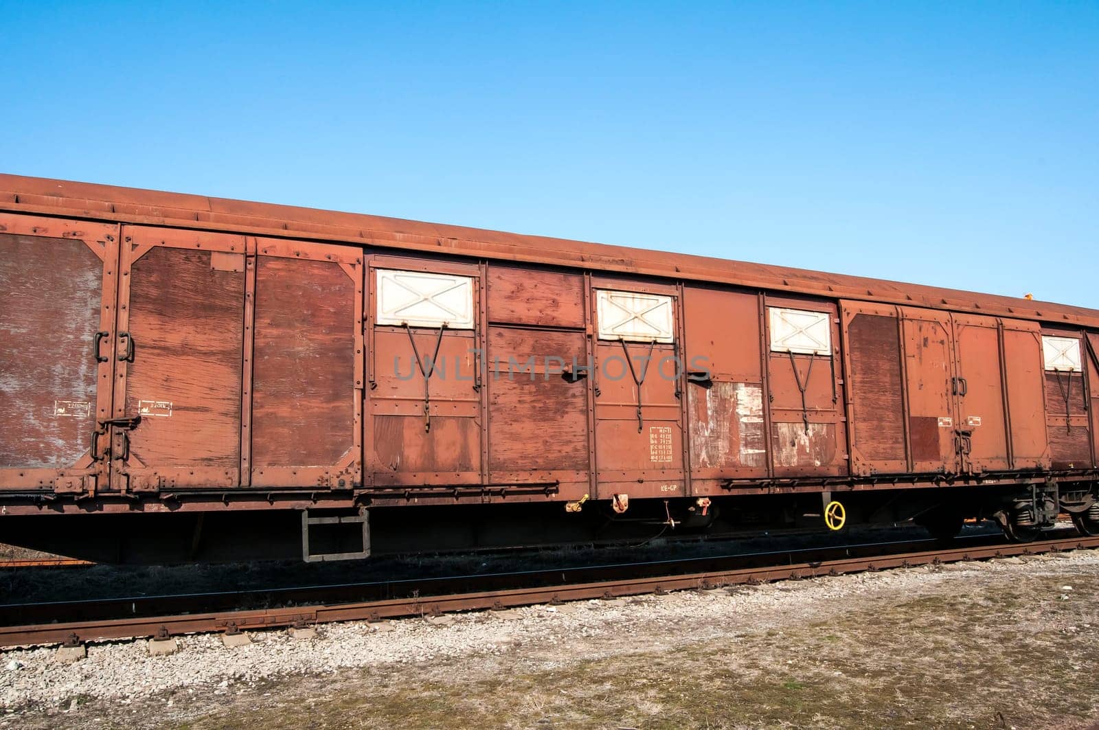 Obsolete wooden cargo railway wagon in perspective view