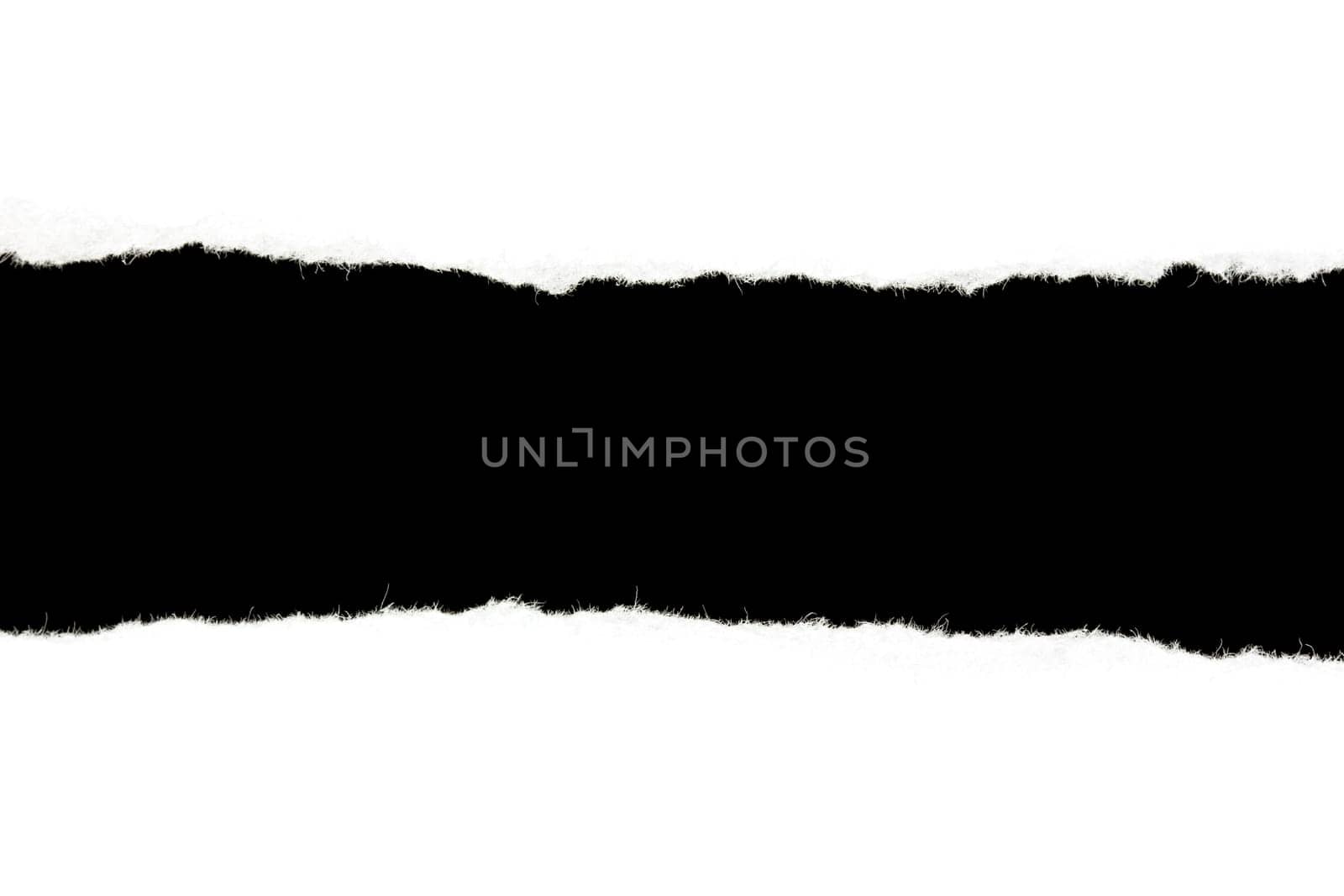 Torn white paper with a black  background.