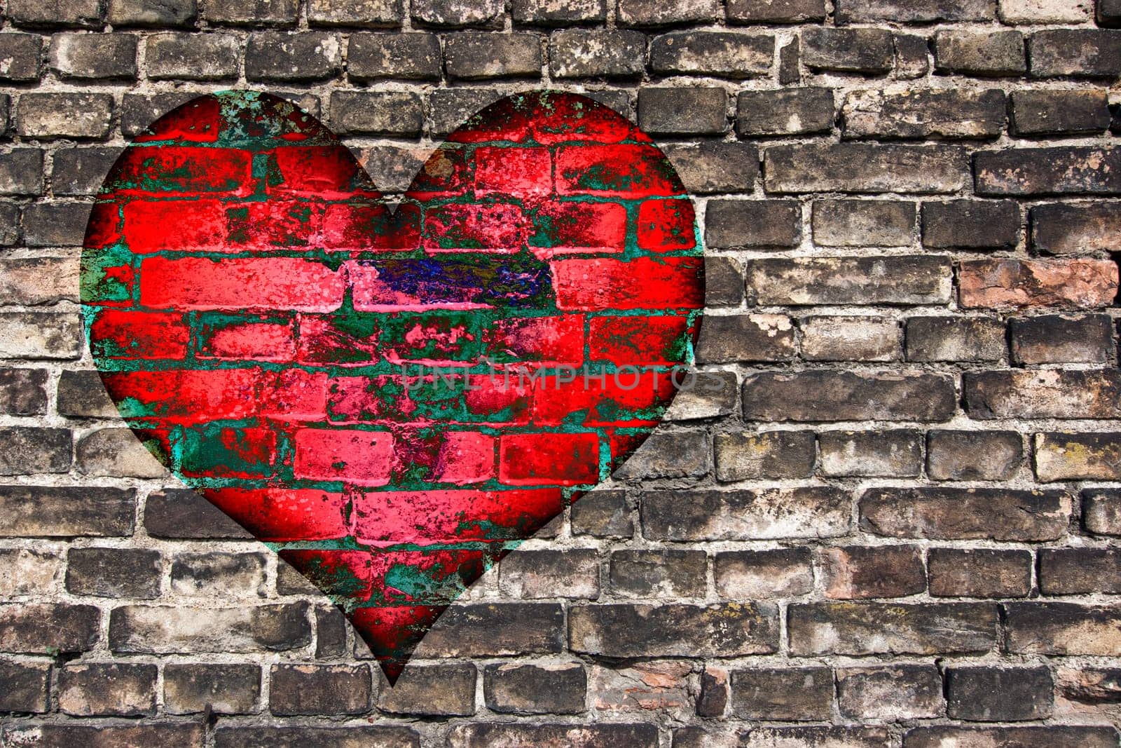 Image of the heart on the old broken brick wall