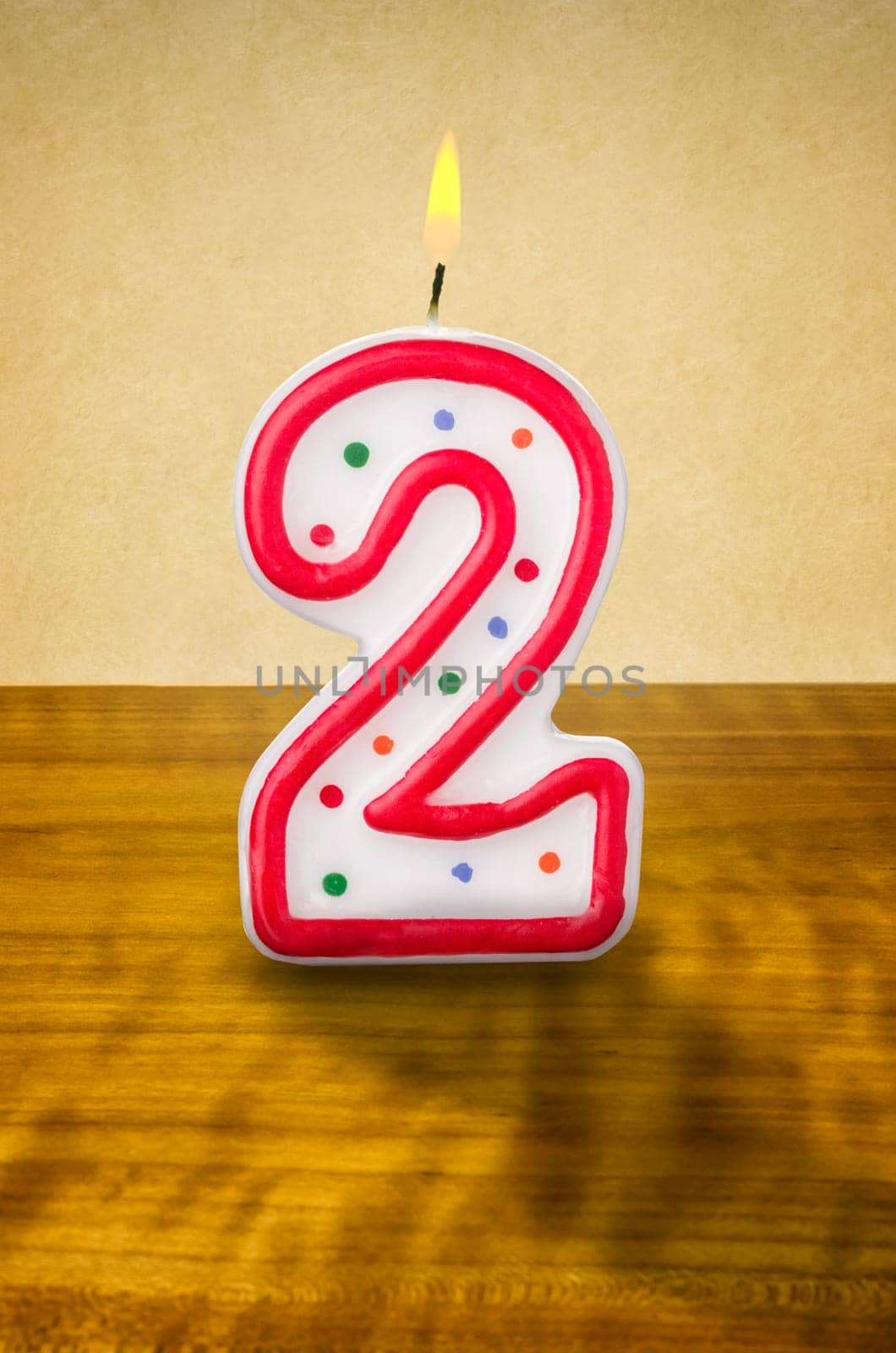 Burning birthday candle number 2