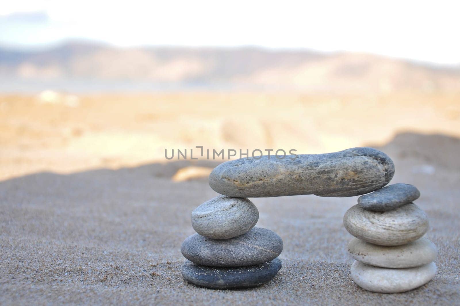 A stack of pebbles in black and white, arch shape, zen concept