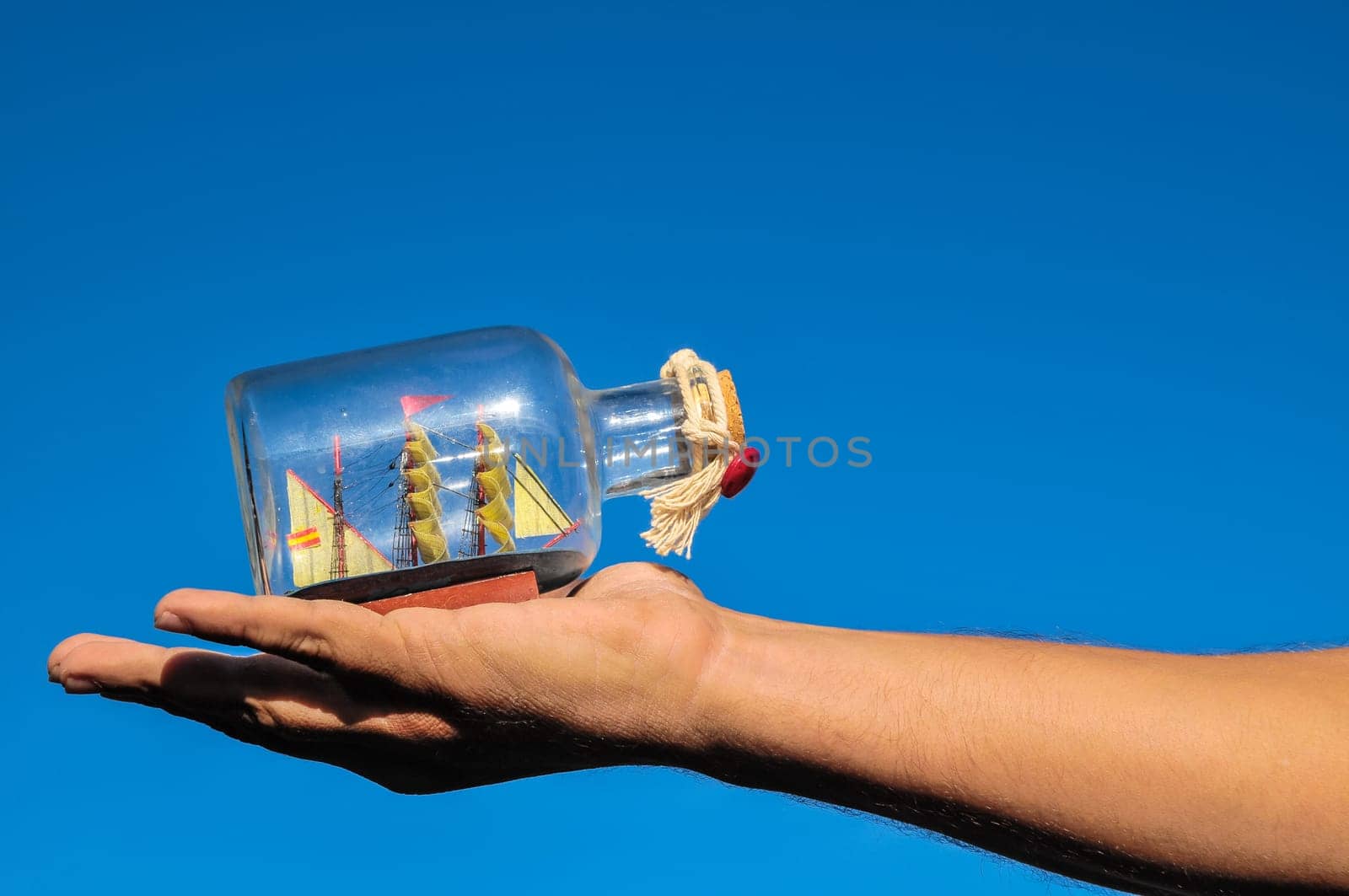 Sailing Boat Vintage Vessel on a Caucasian Hand